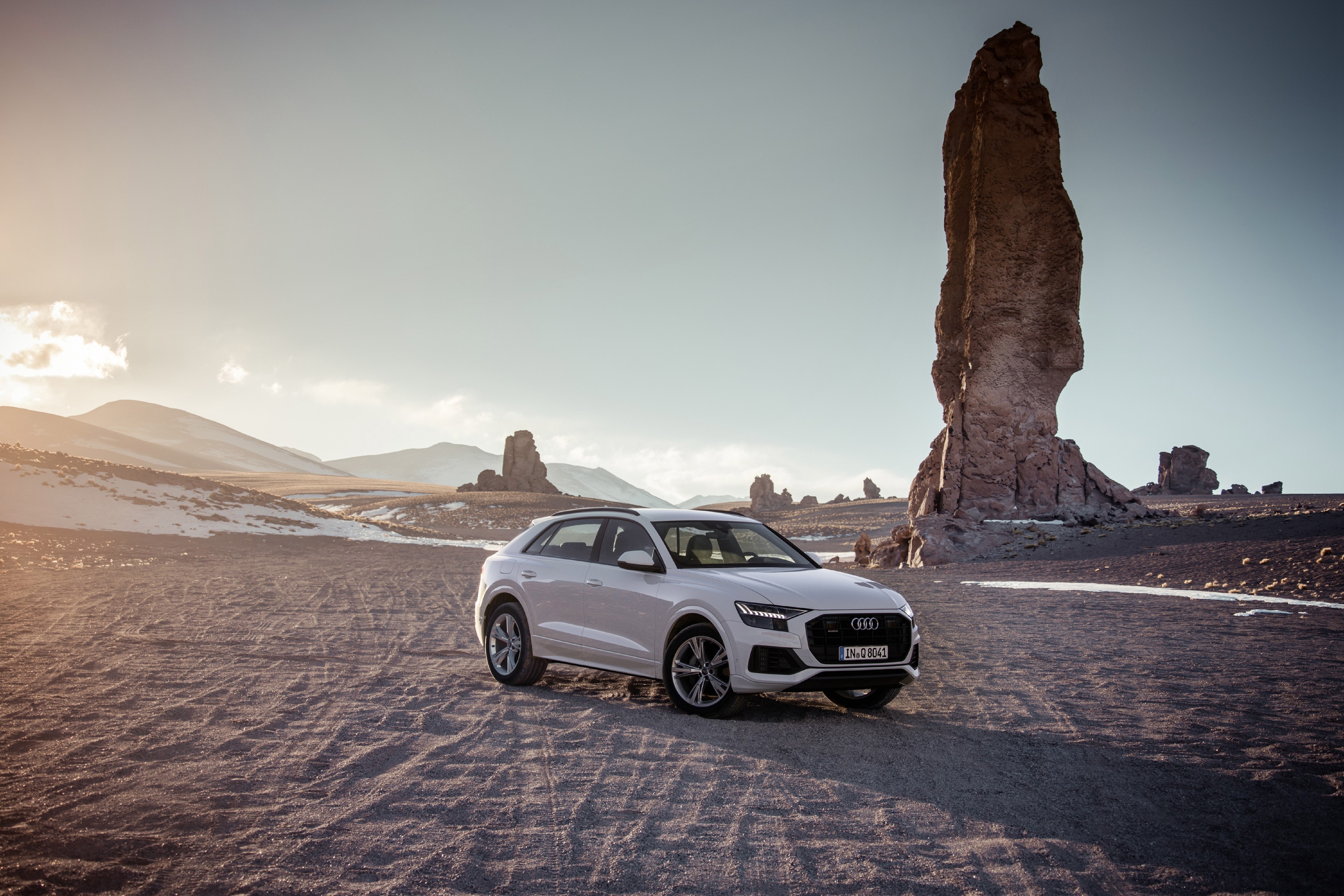 White Audi Q8 in a rocky desert landscape HD Wallpaper