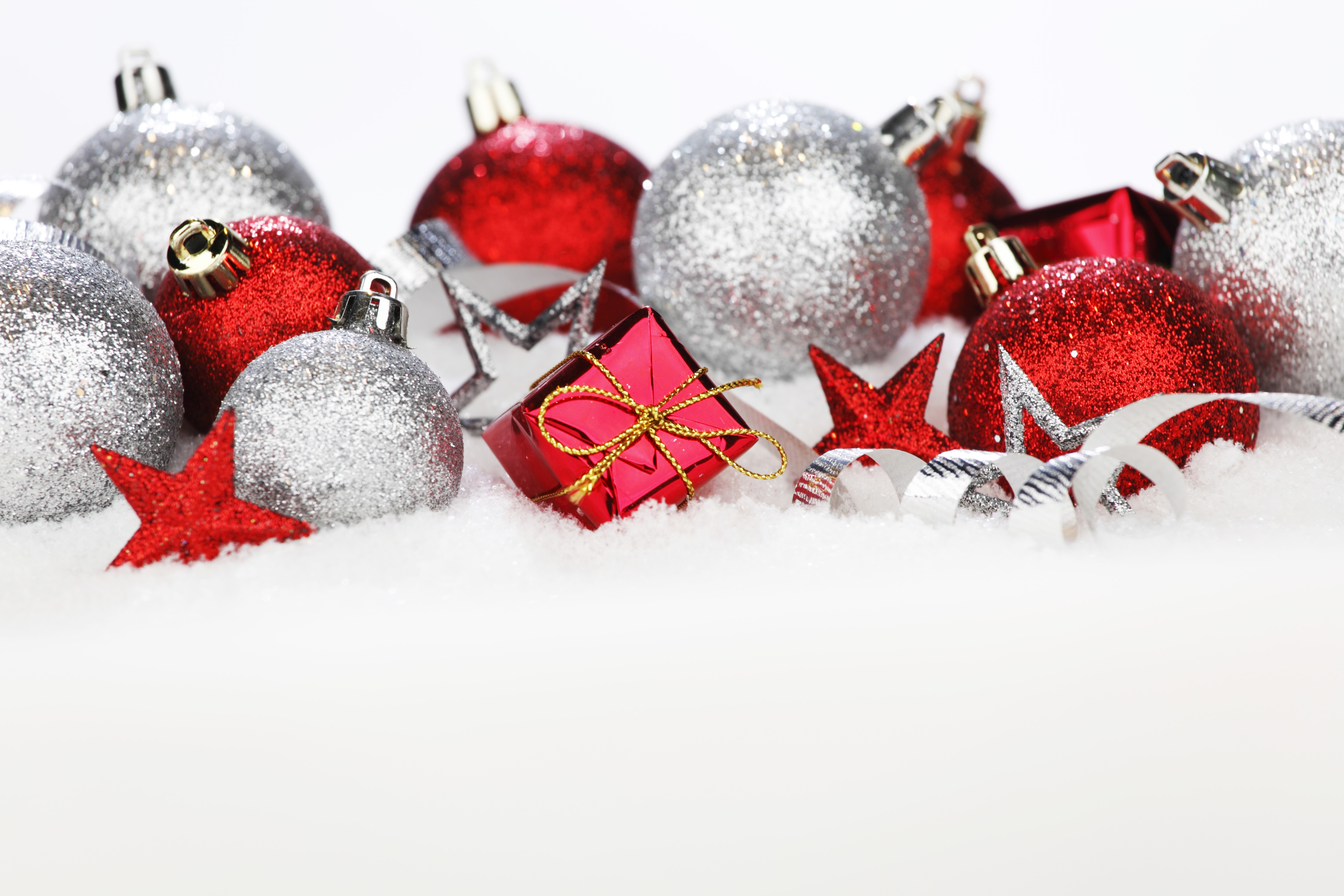 Christmas ornaments and gifts in snow HD Wallpaper
