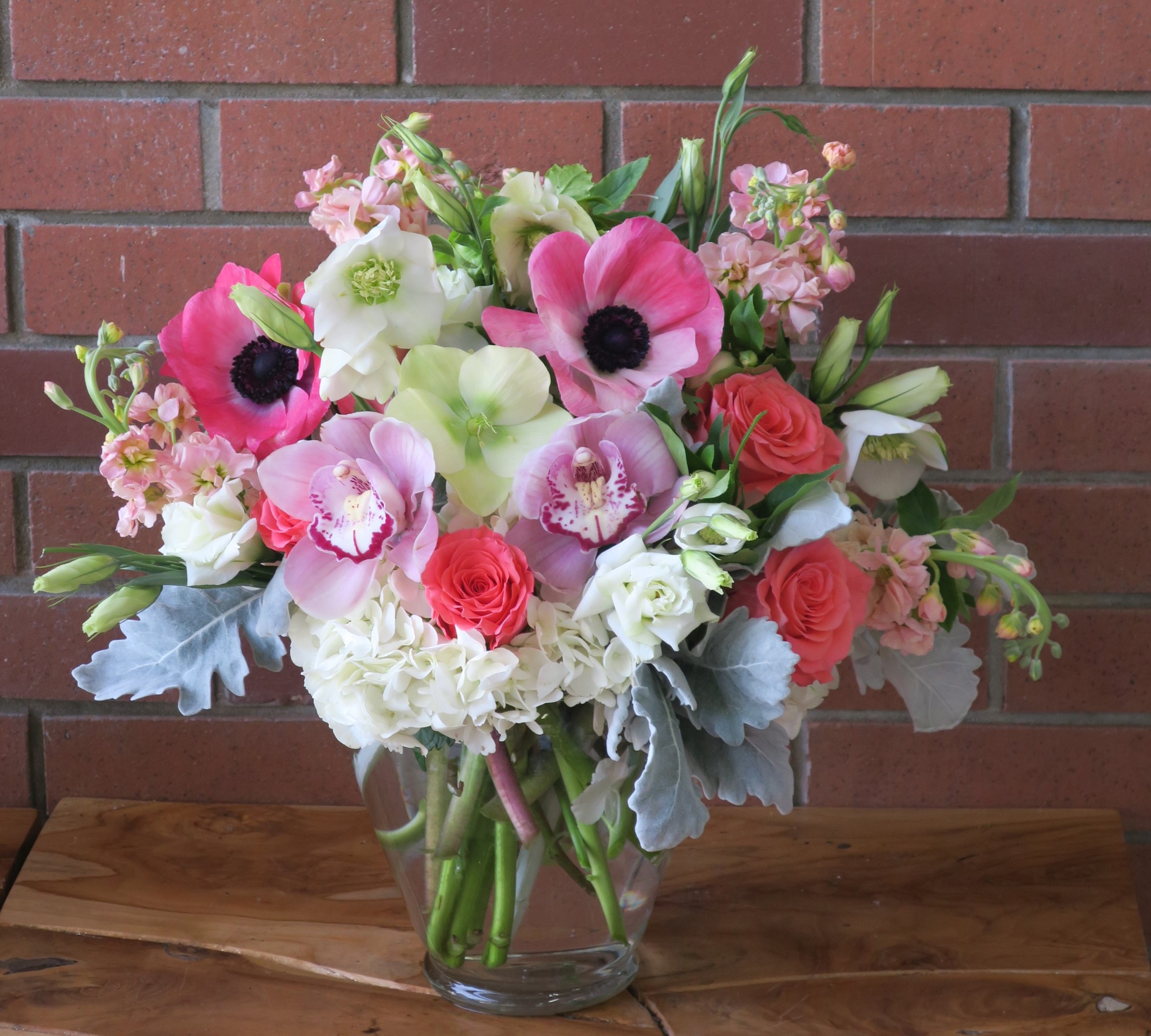 Pink and white floral arrangement with orchids and roses HD Wallpaper