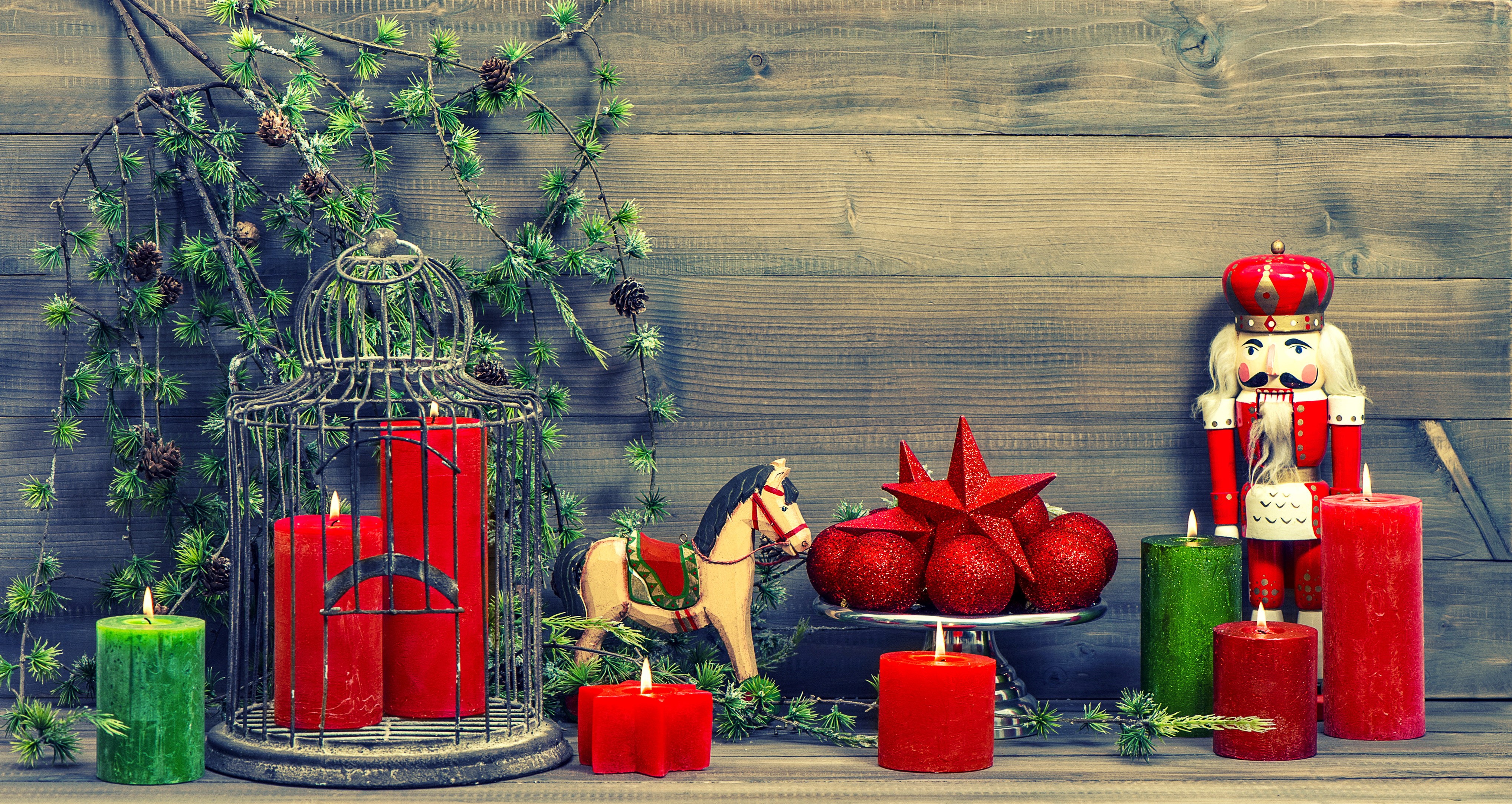 Christmas still life with candles and nutcracker HD Wallpaper