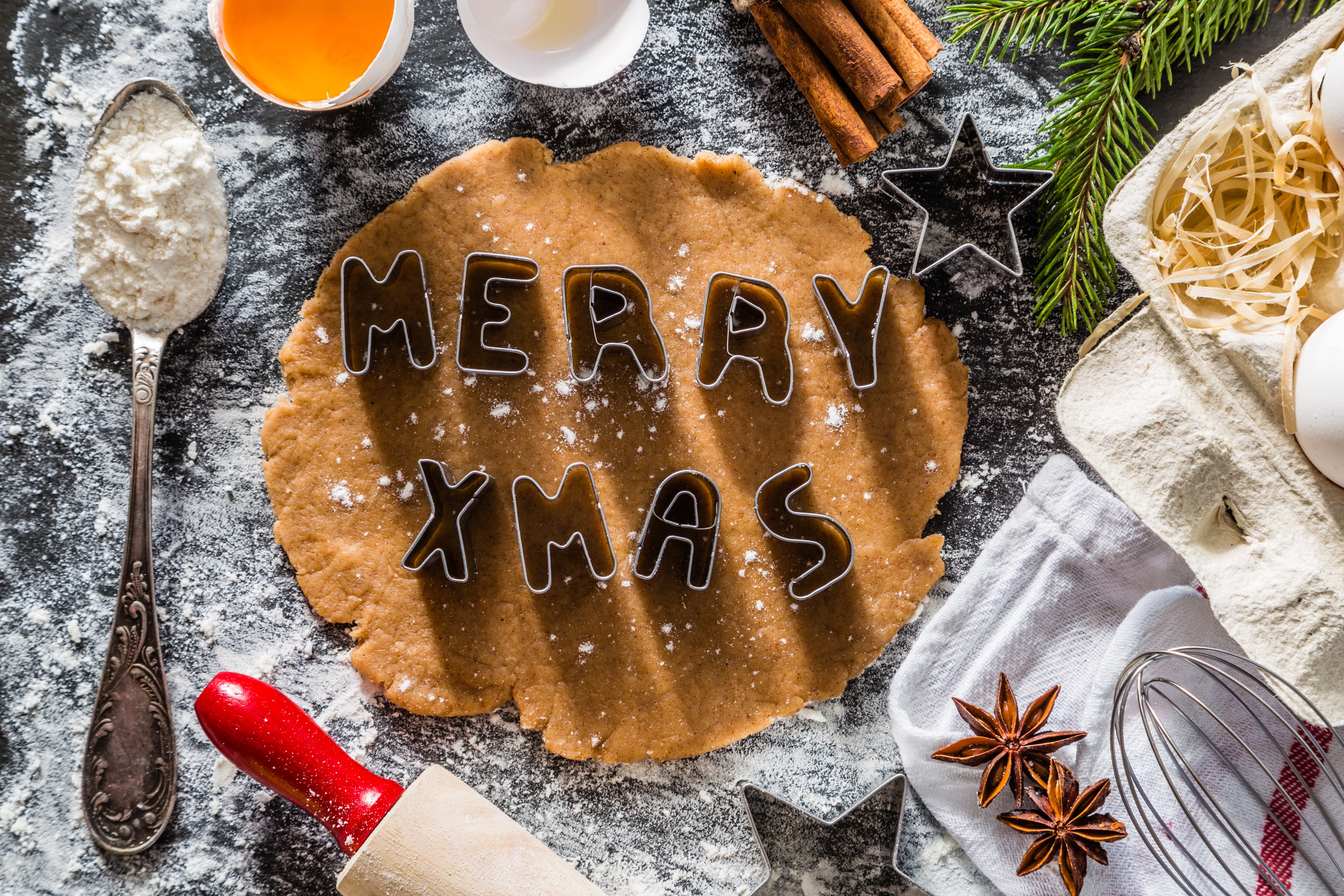 Christmas gingerbread dough with cookie cutters HD Wallpaper
