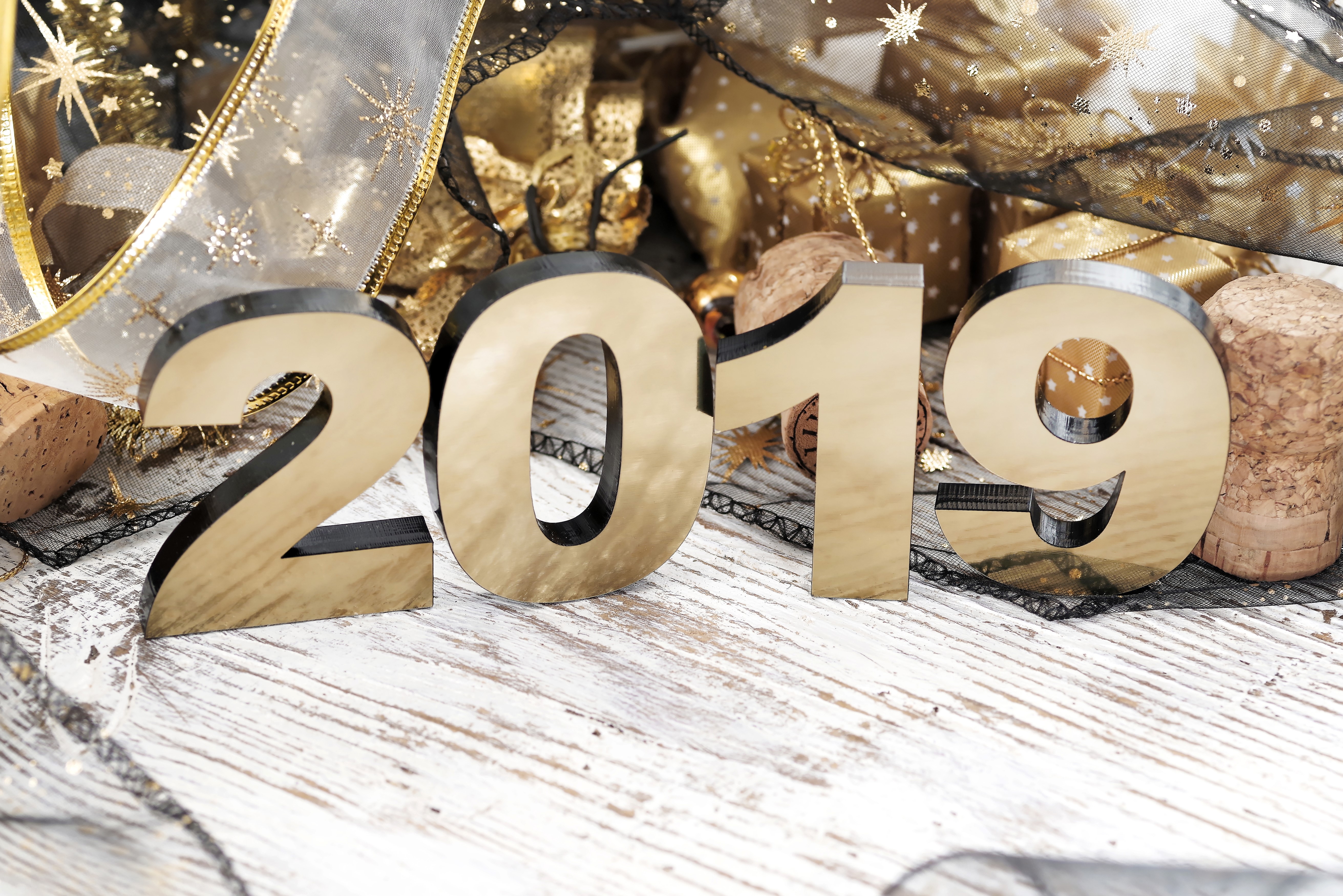 2019 New Year celebration with gold ribbon and gifts HD Wallpaper