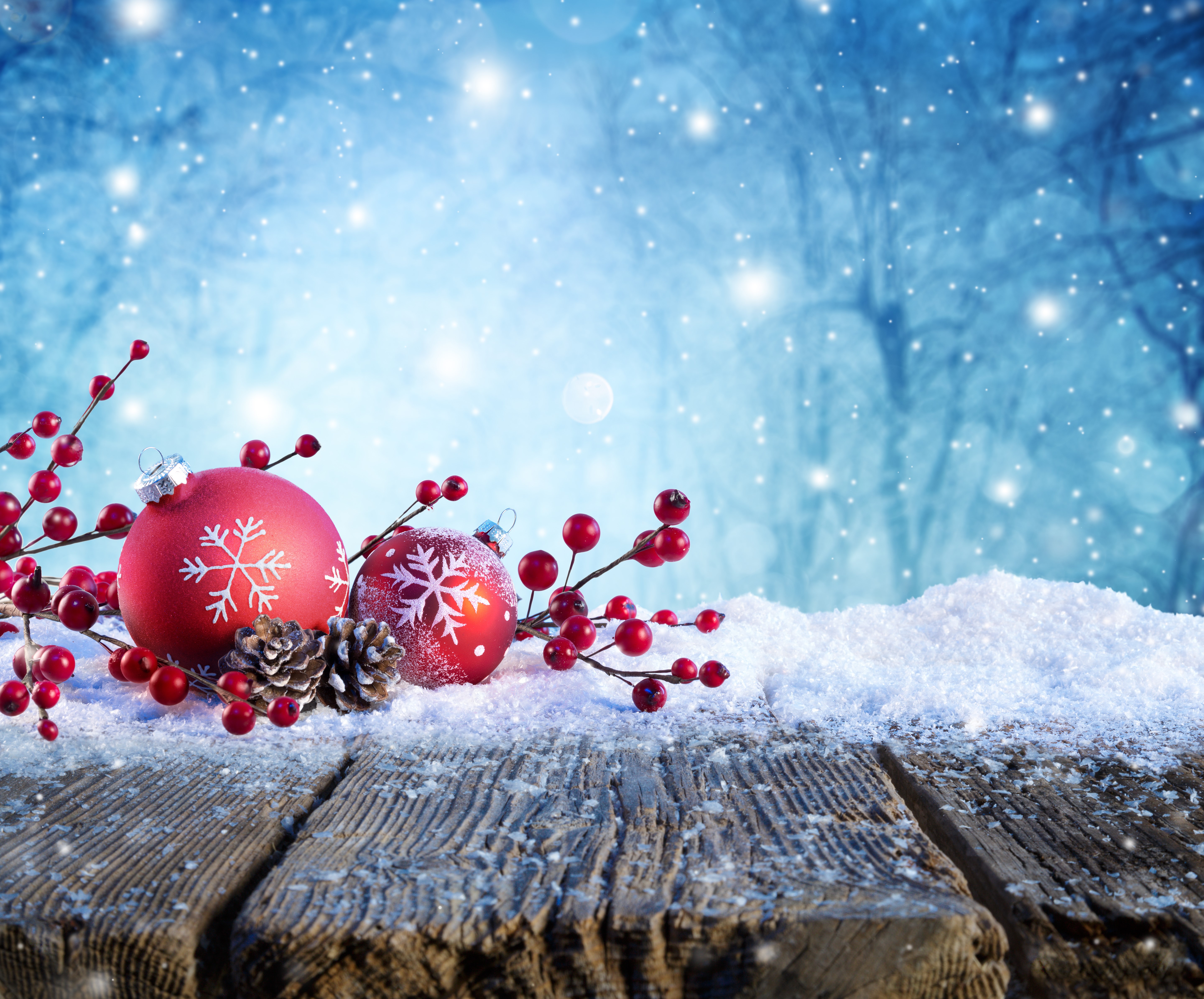 Christmas ornaments and berries on wooden planks with snow HD Wallpaper
