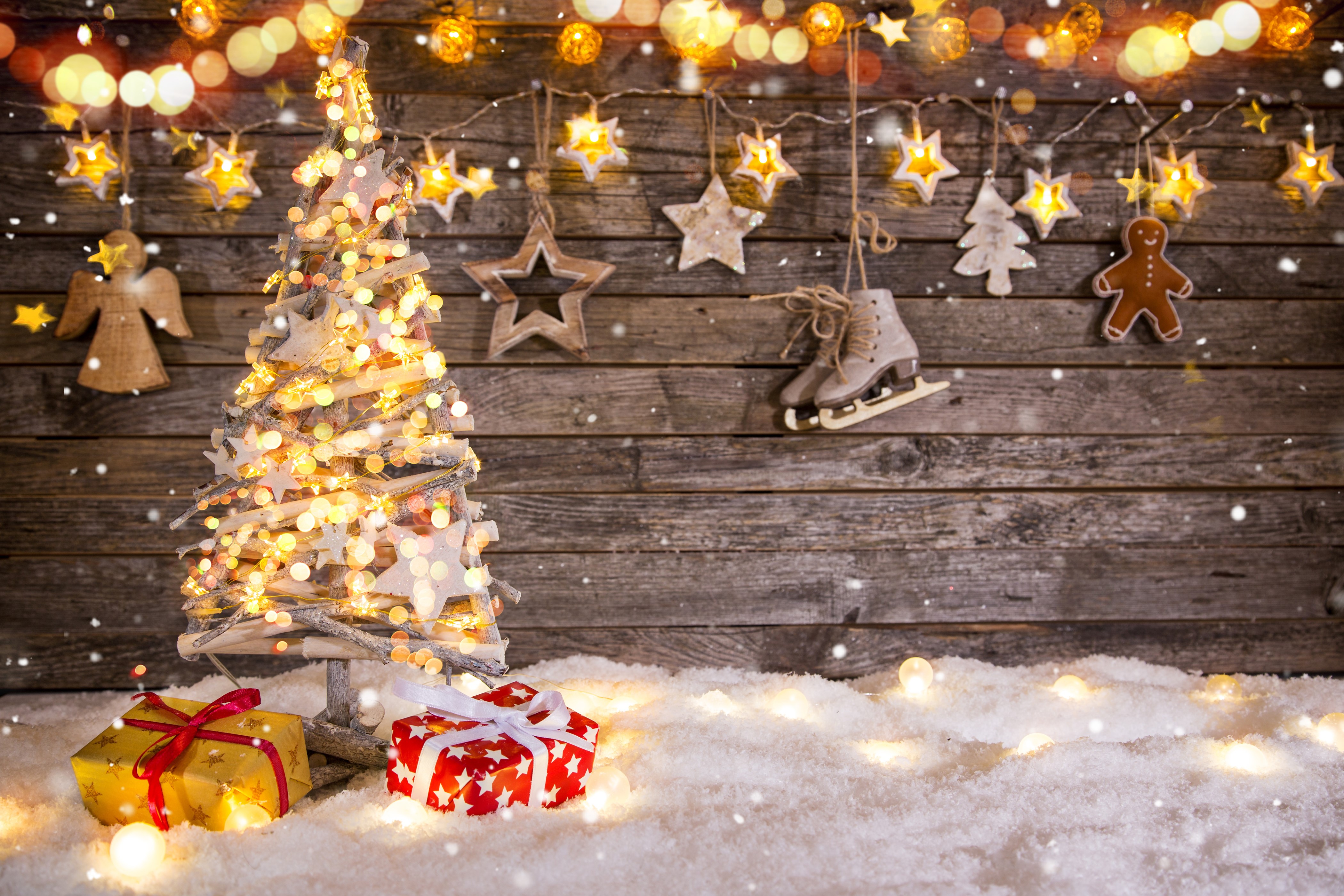 Christmas tree with gifts and decorations on wood planks HD Wallpaper