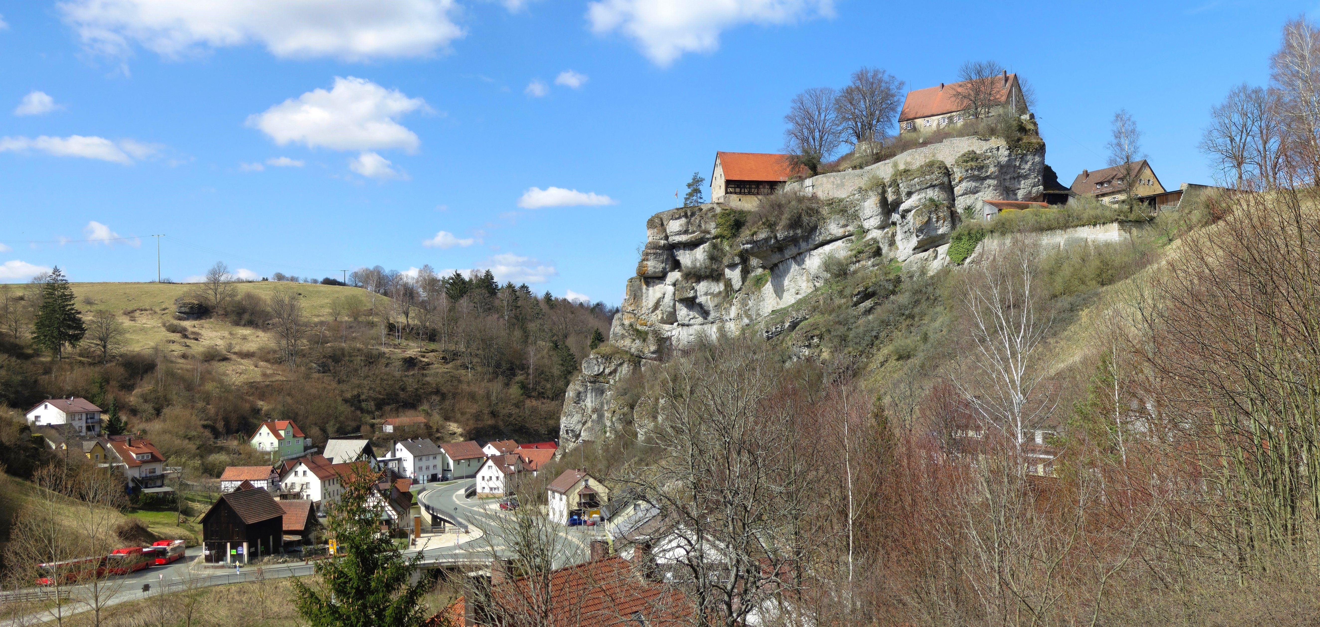 Houses and Castle on a Rocky Hillside in Bavaria, Germany HD Wallpaper