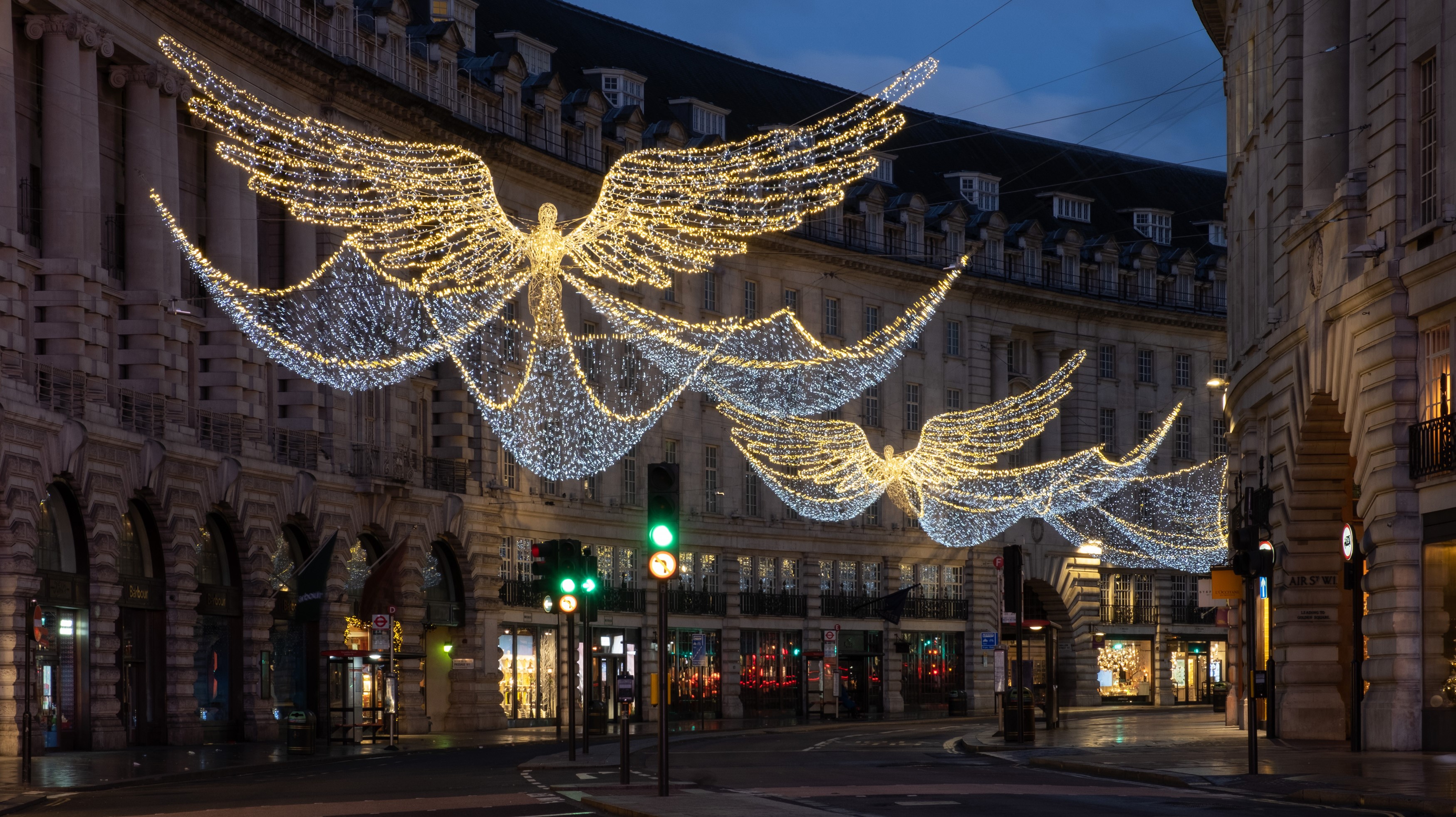Christmas angel lights on a London street at dusk HD Wallpaper