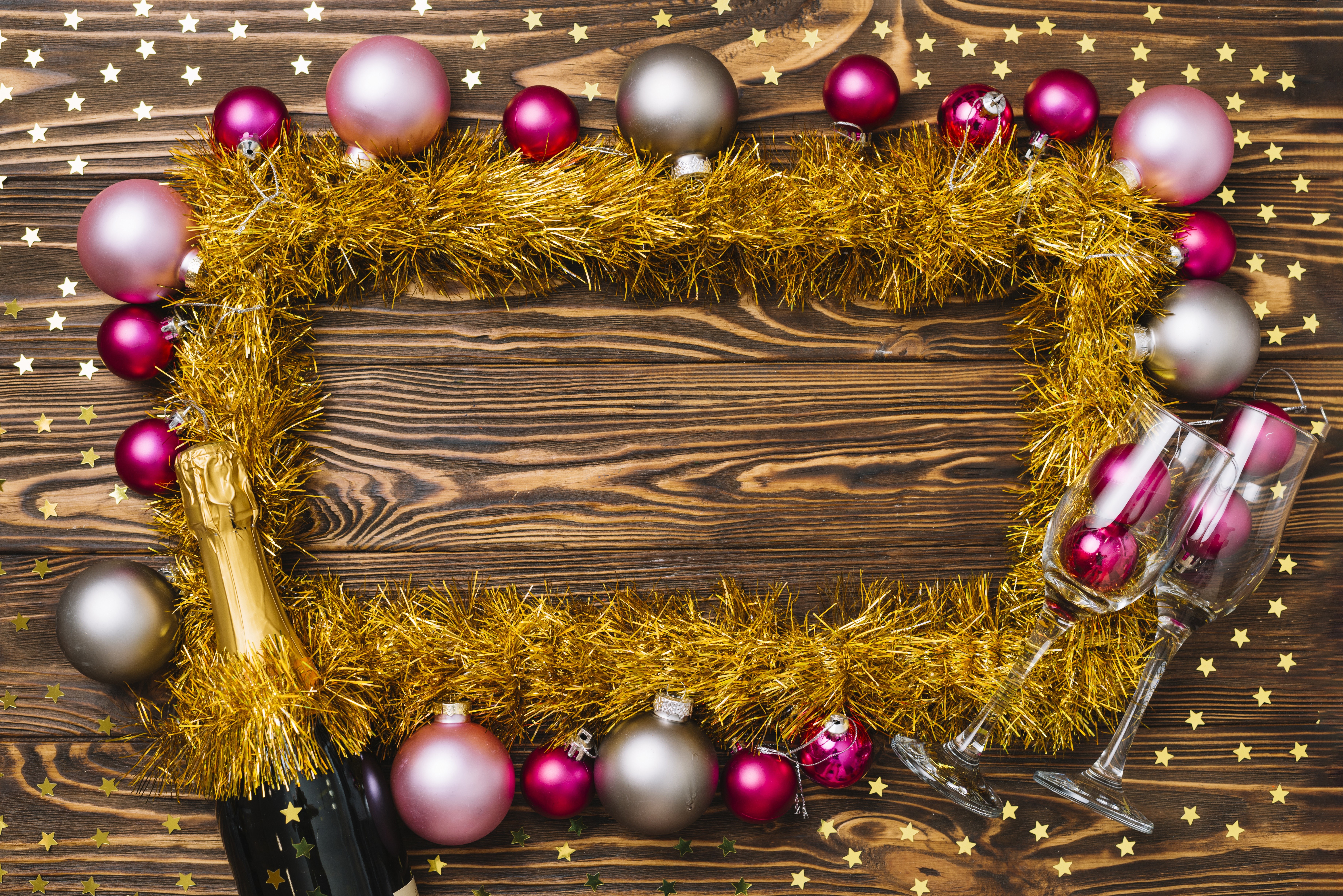 Christmas balls and champagne bottle on wooden background HD Wallpaper