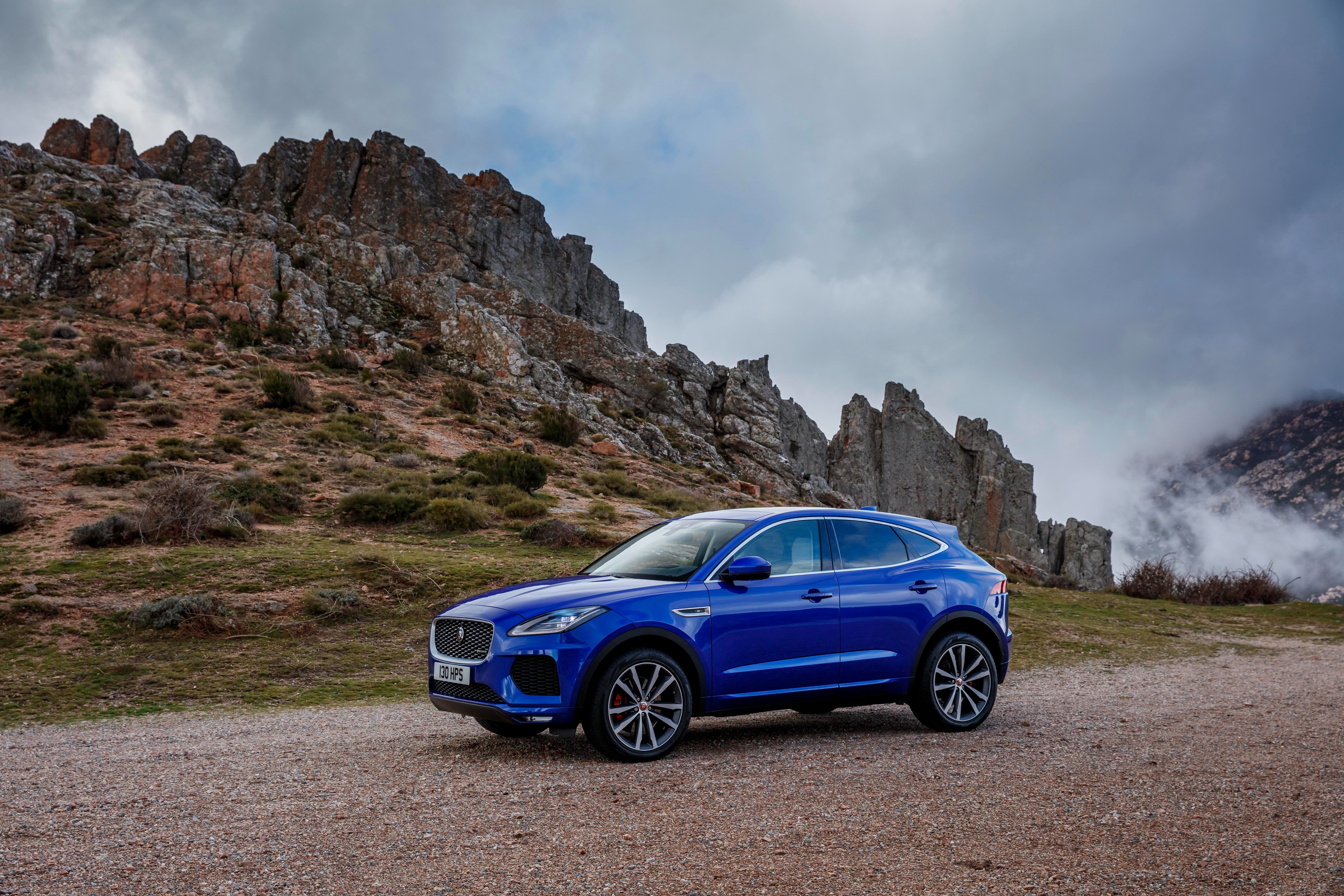 Blue Jaguar E-Pace P300 AWD R-Dynamic in rocky landscape HD Wallpaper