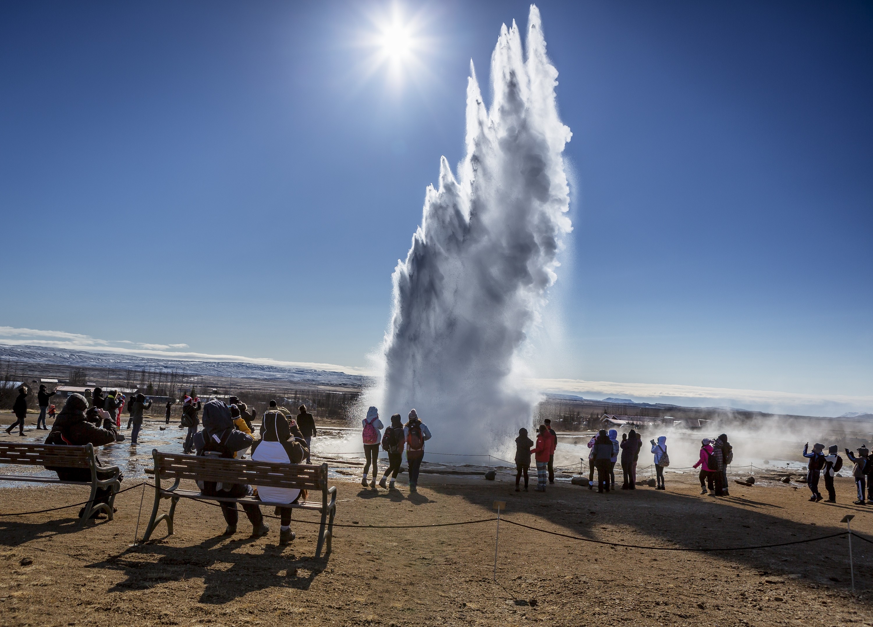 Geyser Strokkur erupting in Iceland with tourists HD Wallpaper