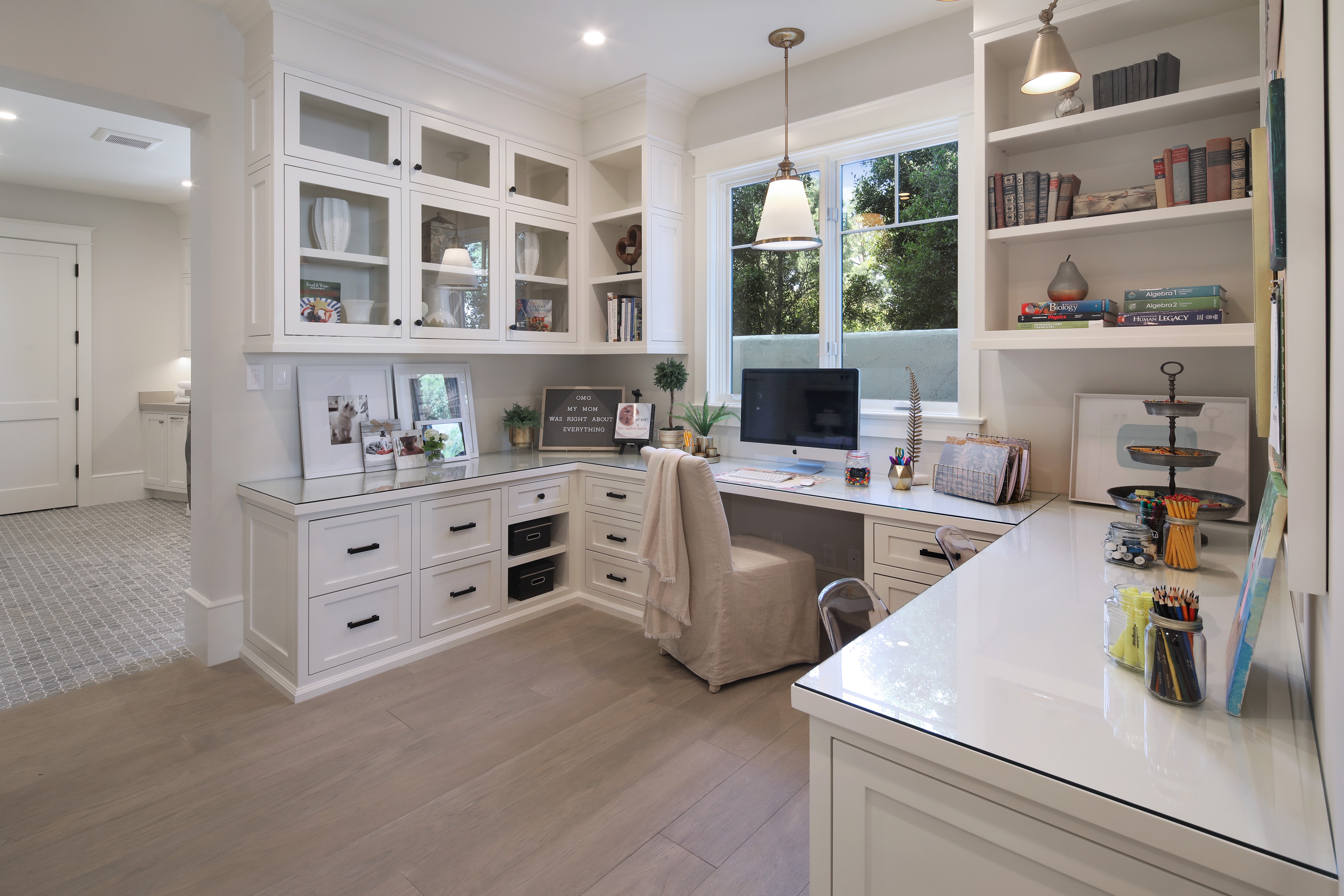 Home office with white cabinets and desk HD Wallpaper
