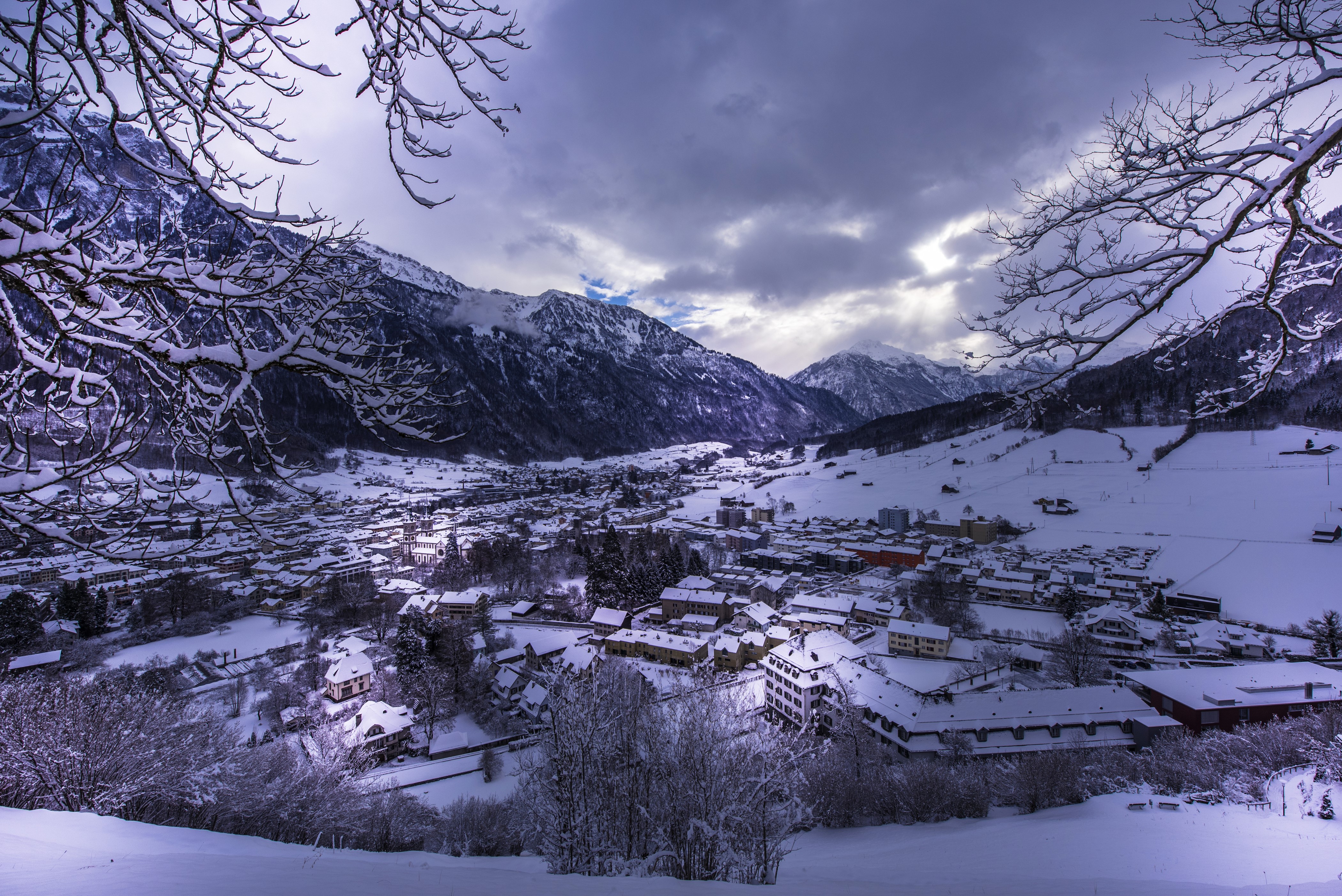 4K Glarus Switzerland Winter Mountains Snow Houses HD Wallpaper