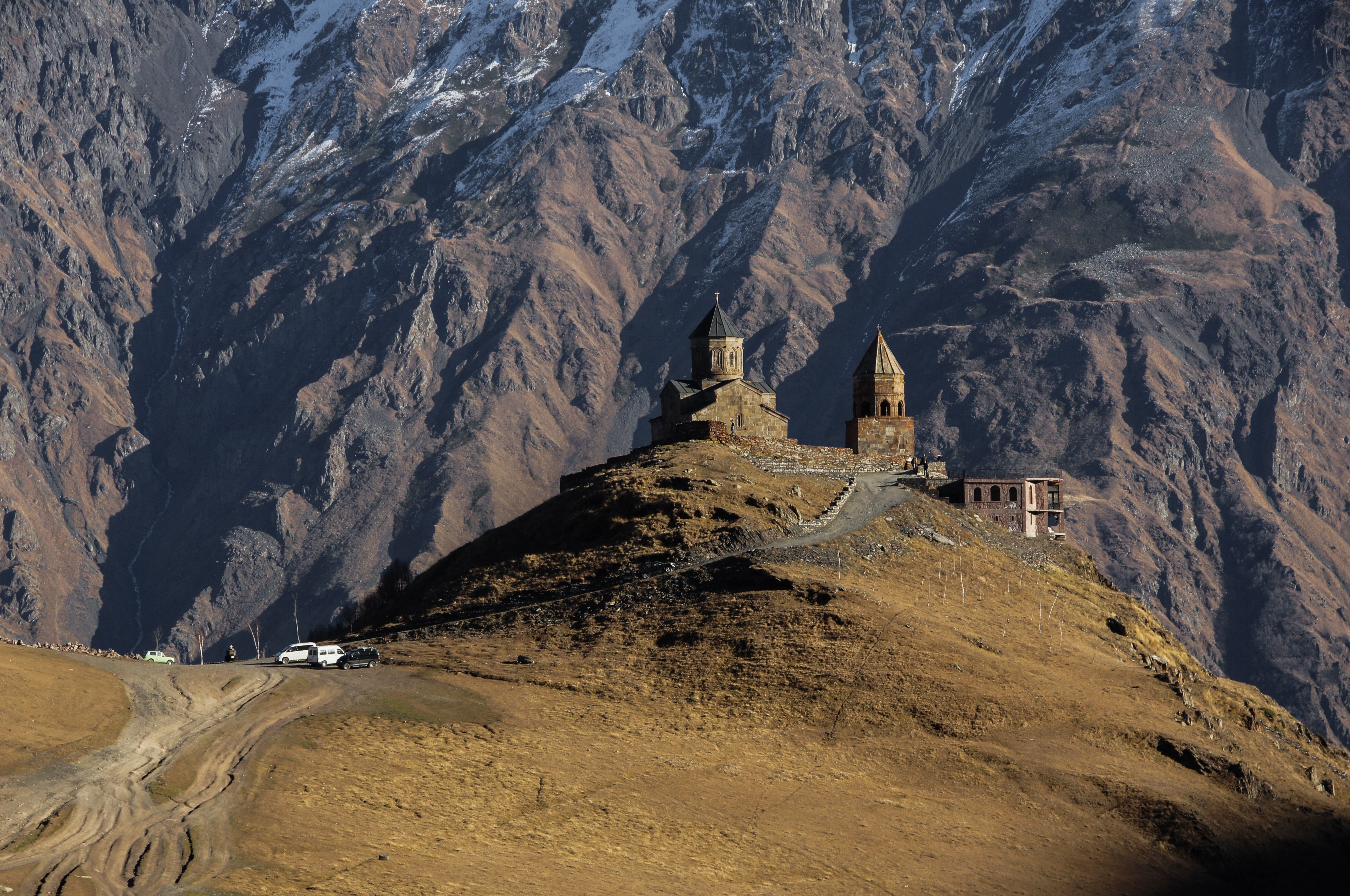 4K Kazbegi Gergeti Church in Georgia Mountains HD Wallpaper