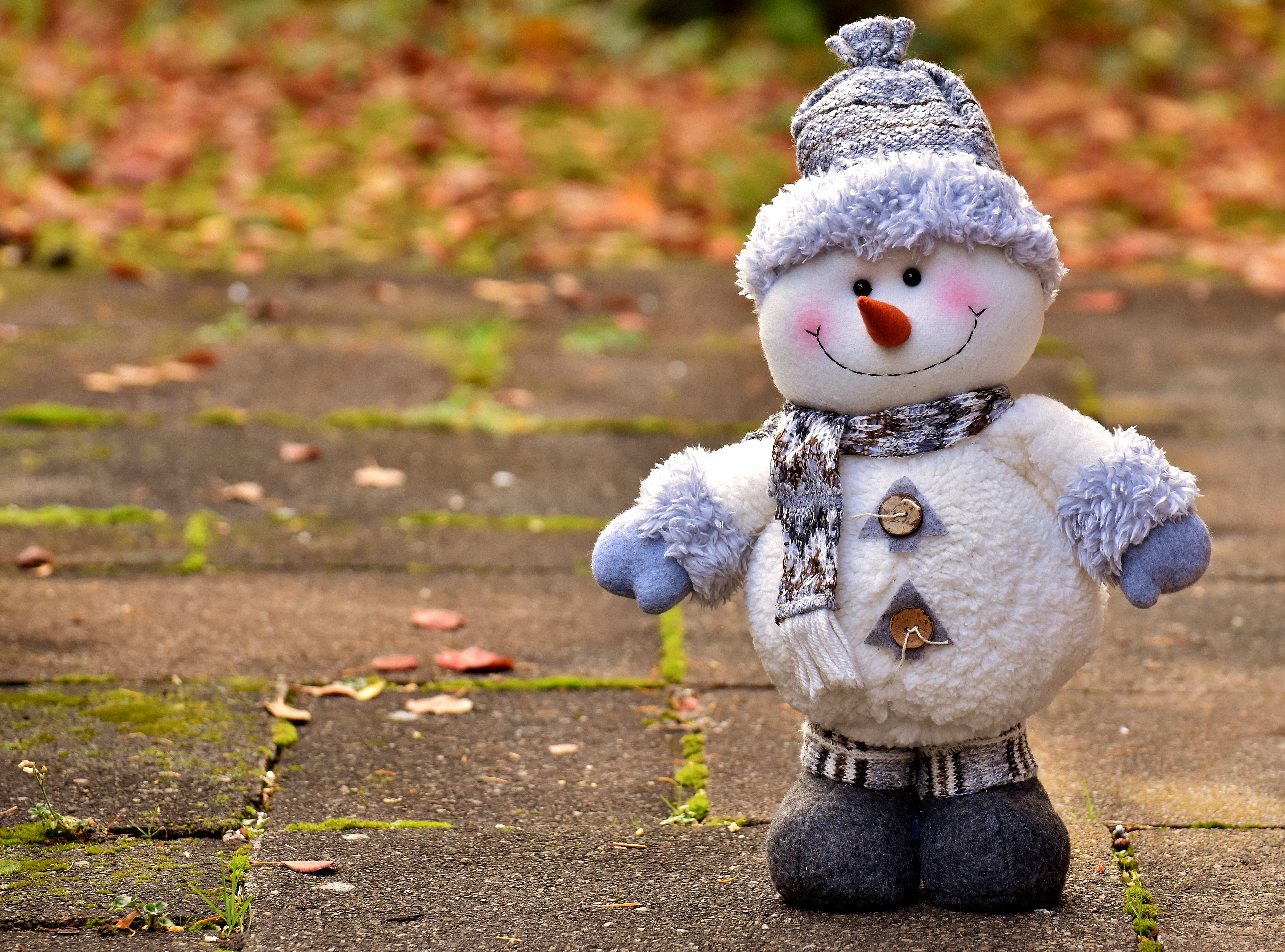 Plush Snowman with Winter Hat and Scarf HD Wallpaper