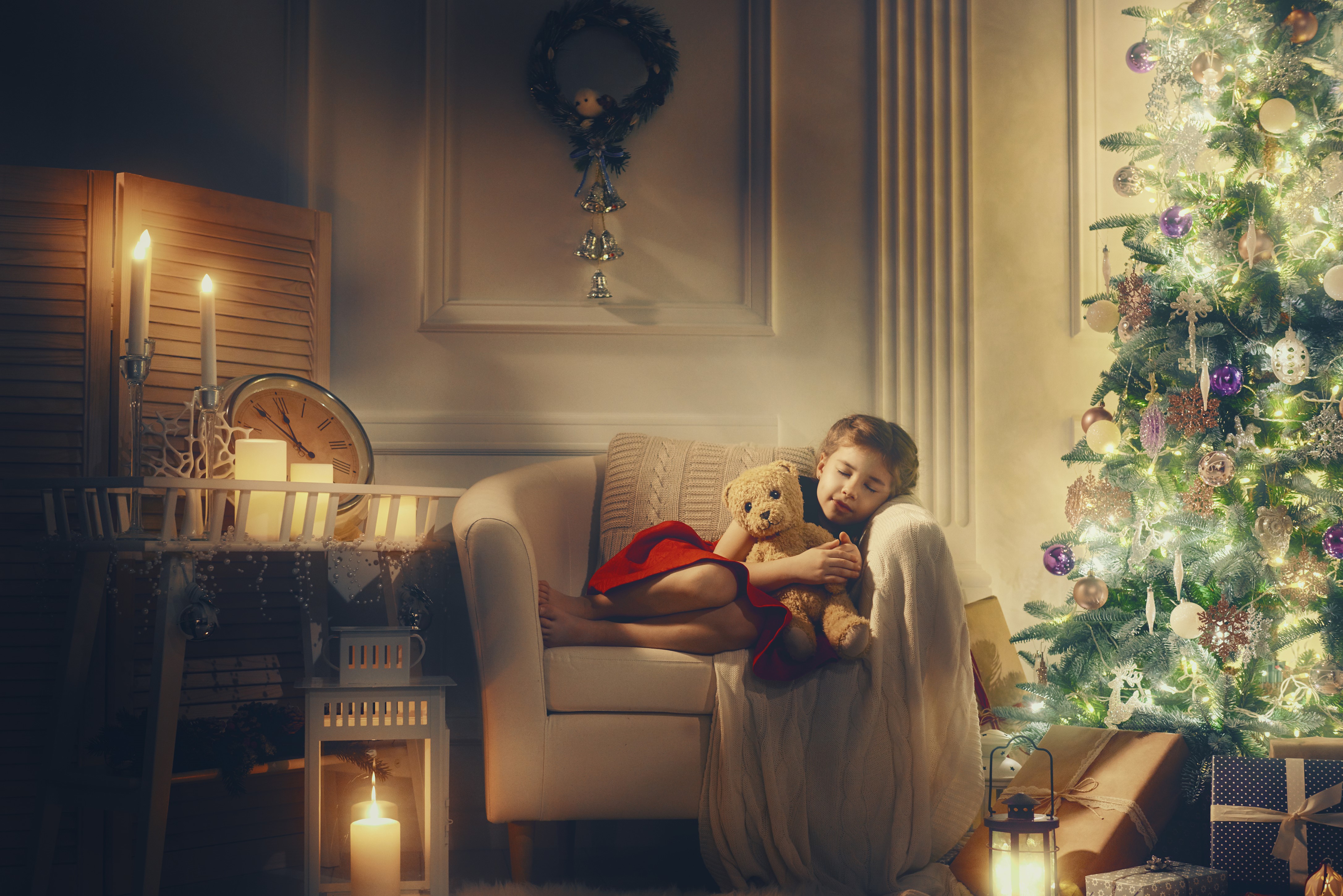 Girl sleeping with teddy bear by Christmas tree HD Wallpaper
