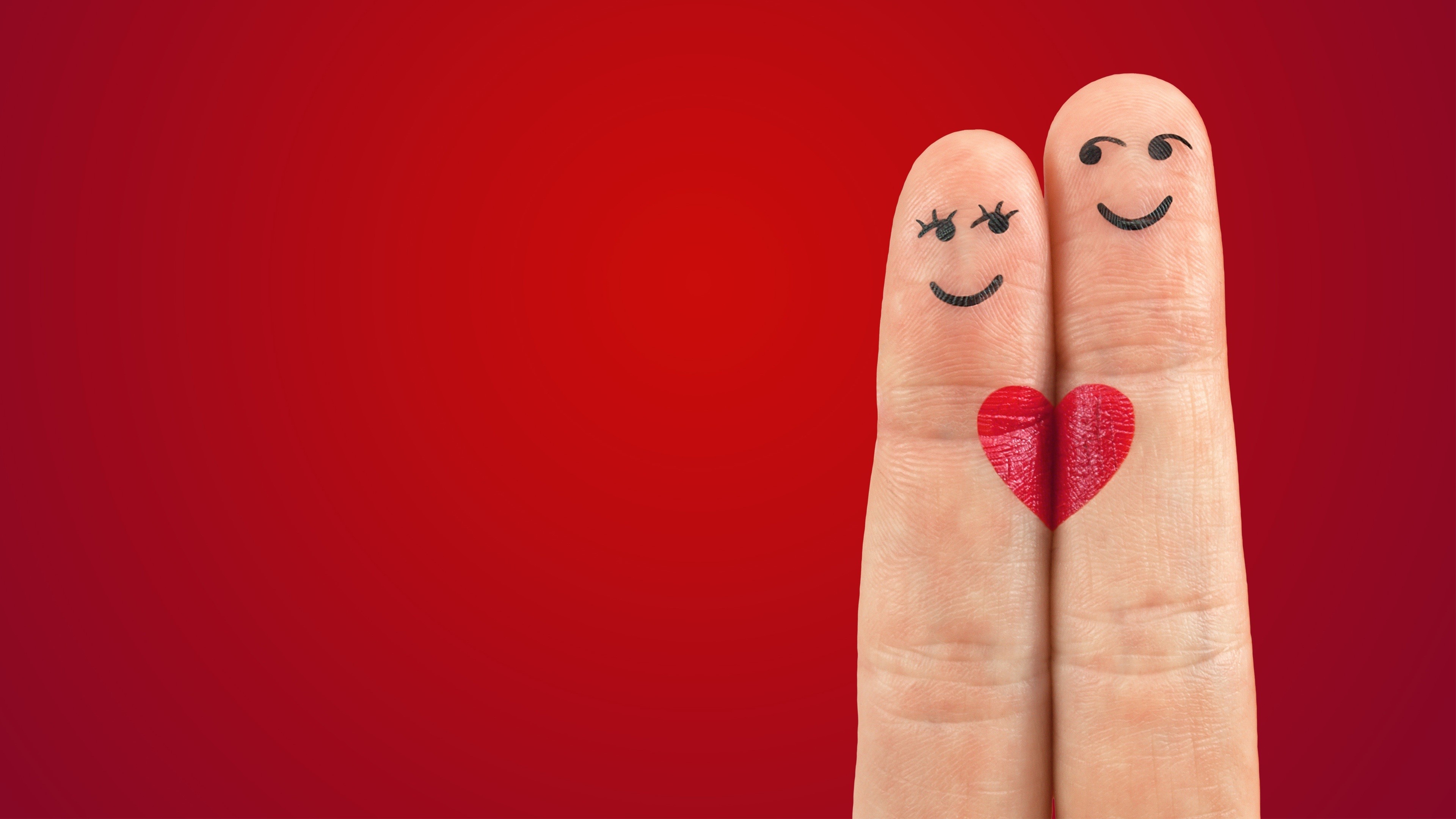 Two fingers with drawn faces and a heart HD Wallpaper
