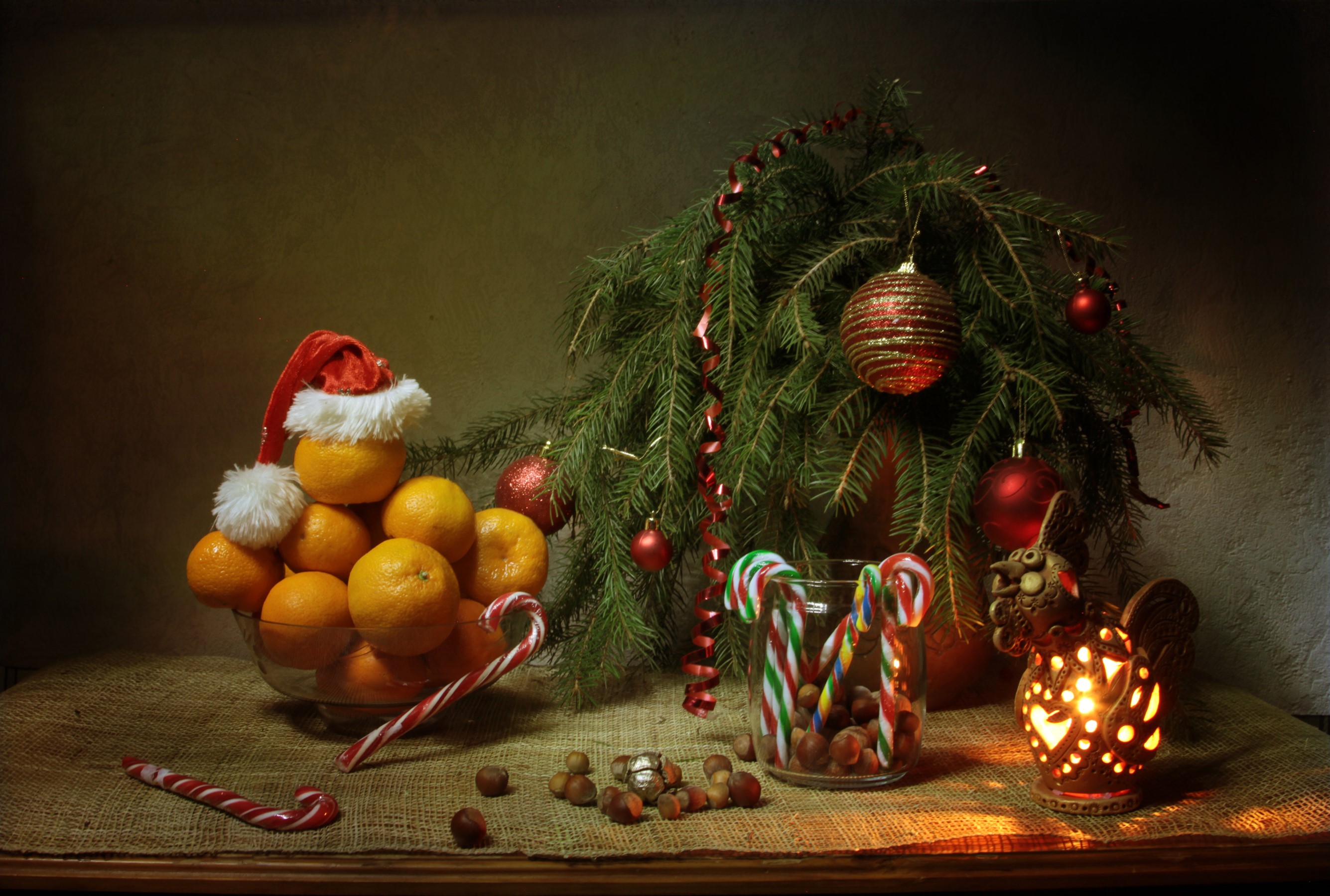 Christmas still life with oranges, candy canes, and nuts HD Wallpaper