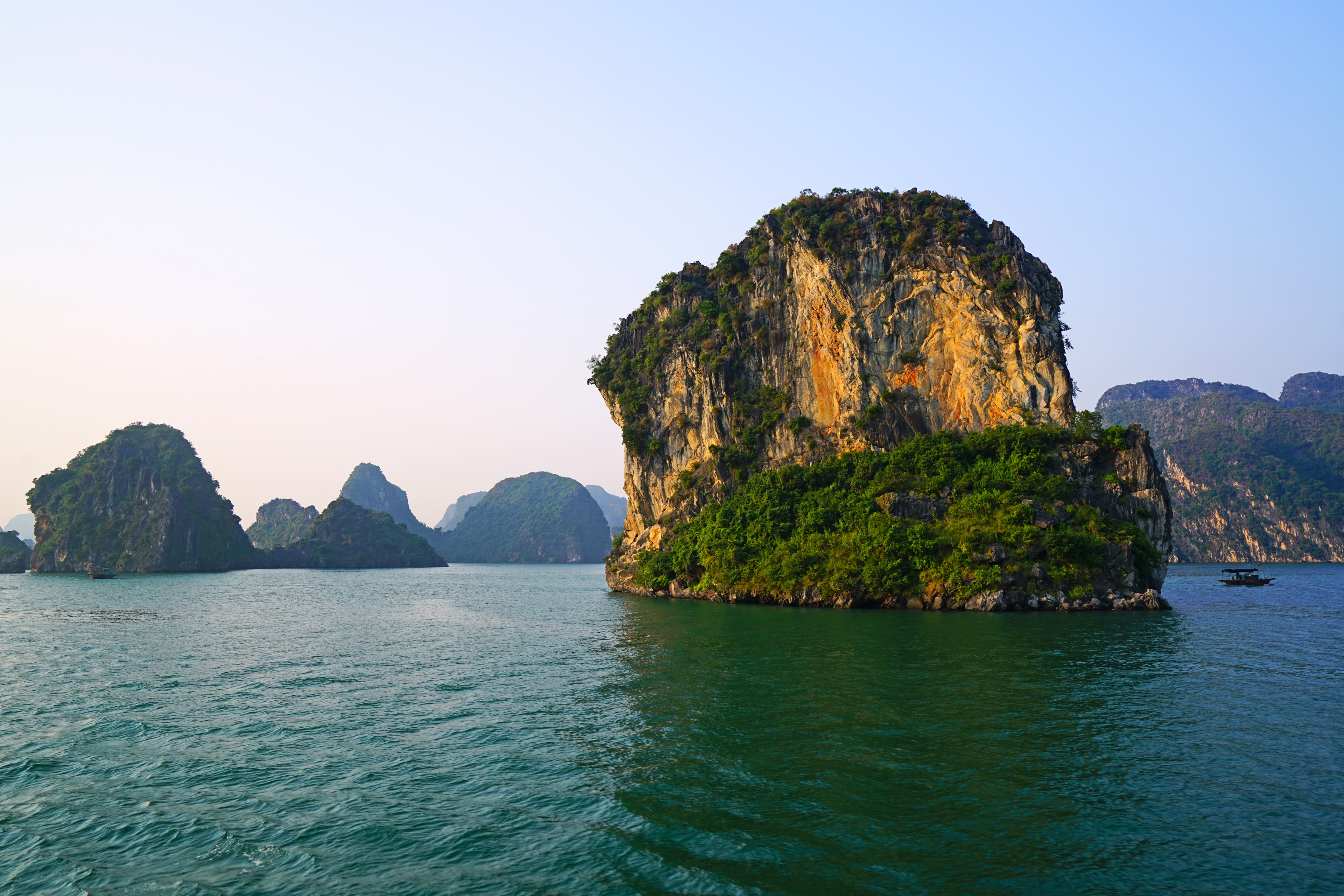 Ha Long Bay, Vietnam with limestone karsts and a boat HD Wallpaper