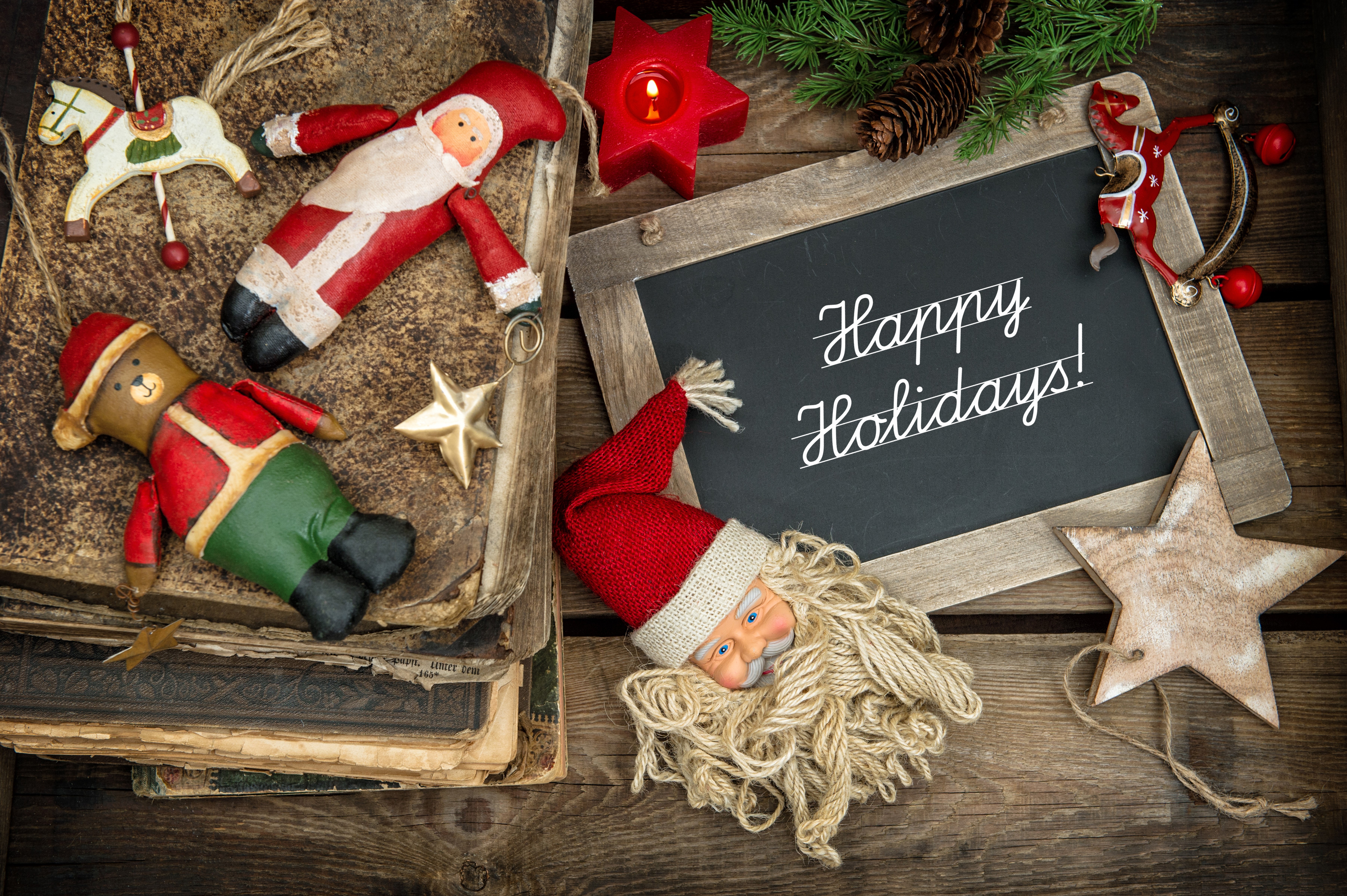 Christmas decorations with Santa Claus and books HD Wallpaper