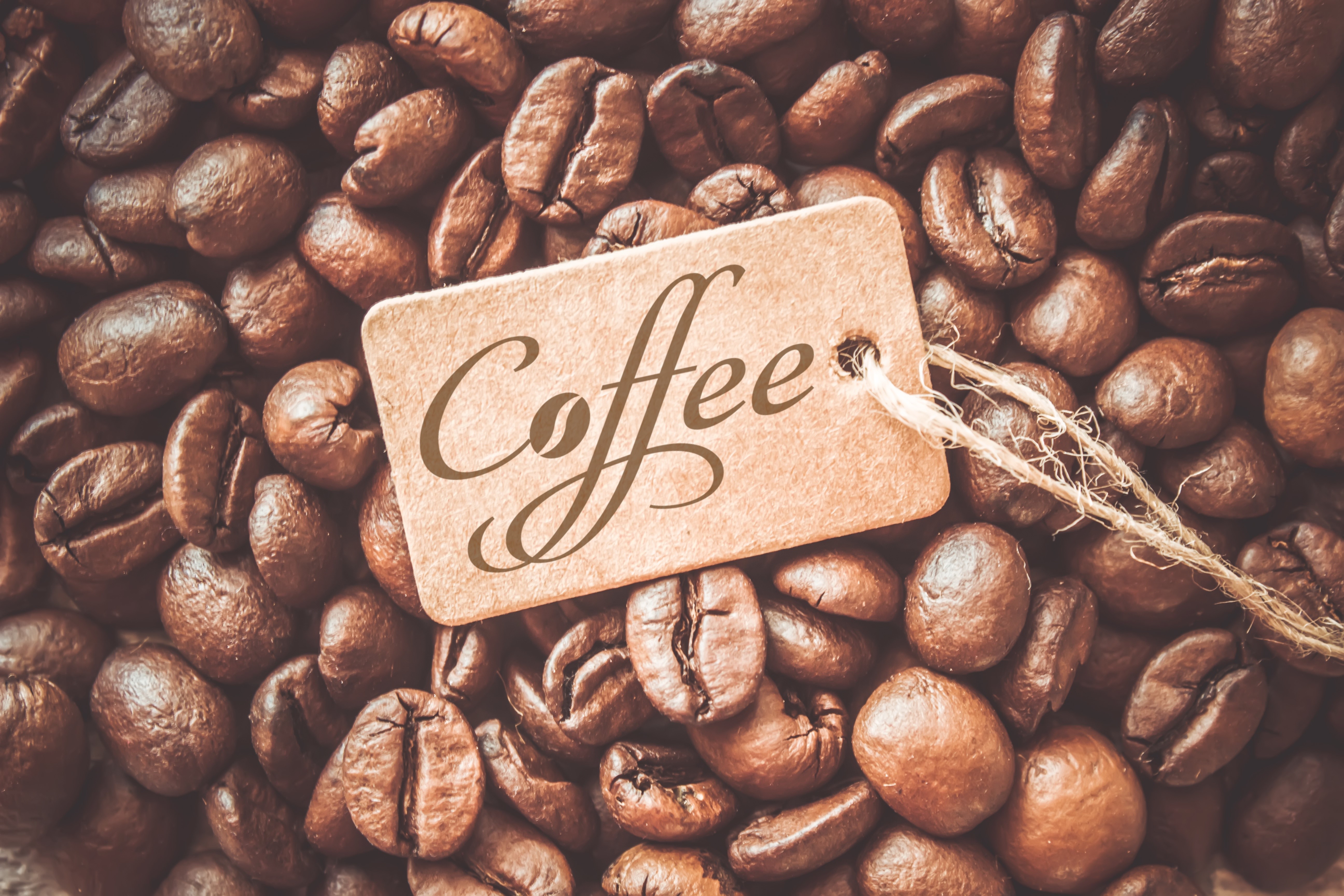 Coffee beans with a "Coffee" tag HD Wallpaper