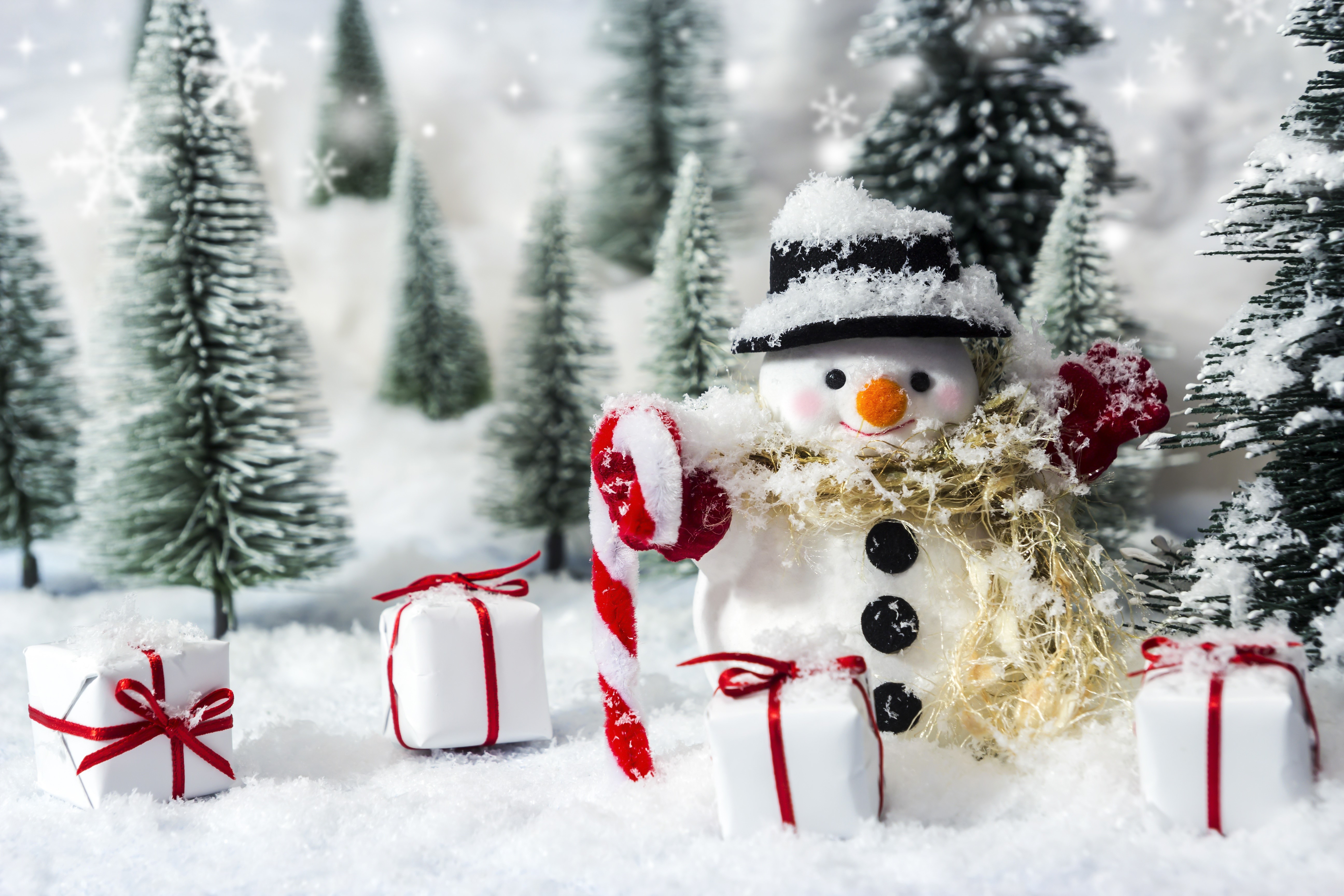 Snowman with Candy Cane and Gifts in Snowy Forest HD Wallpaper
