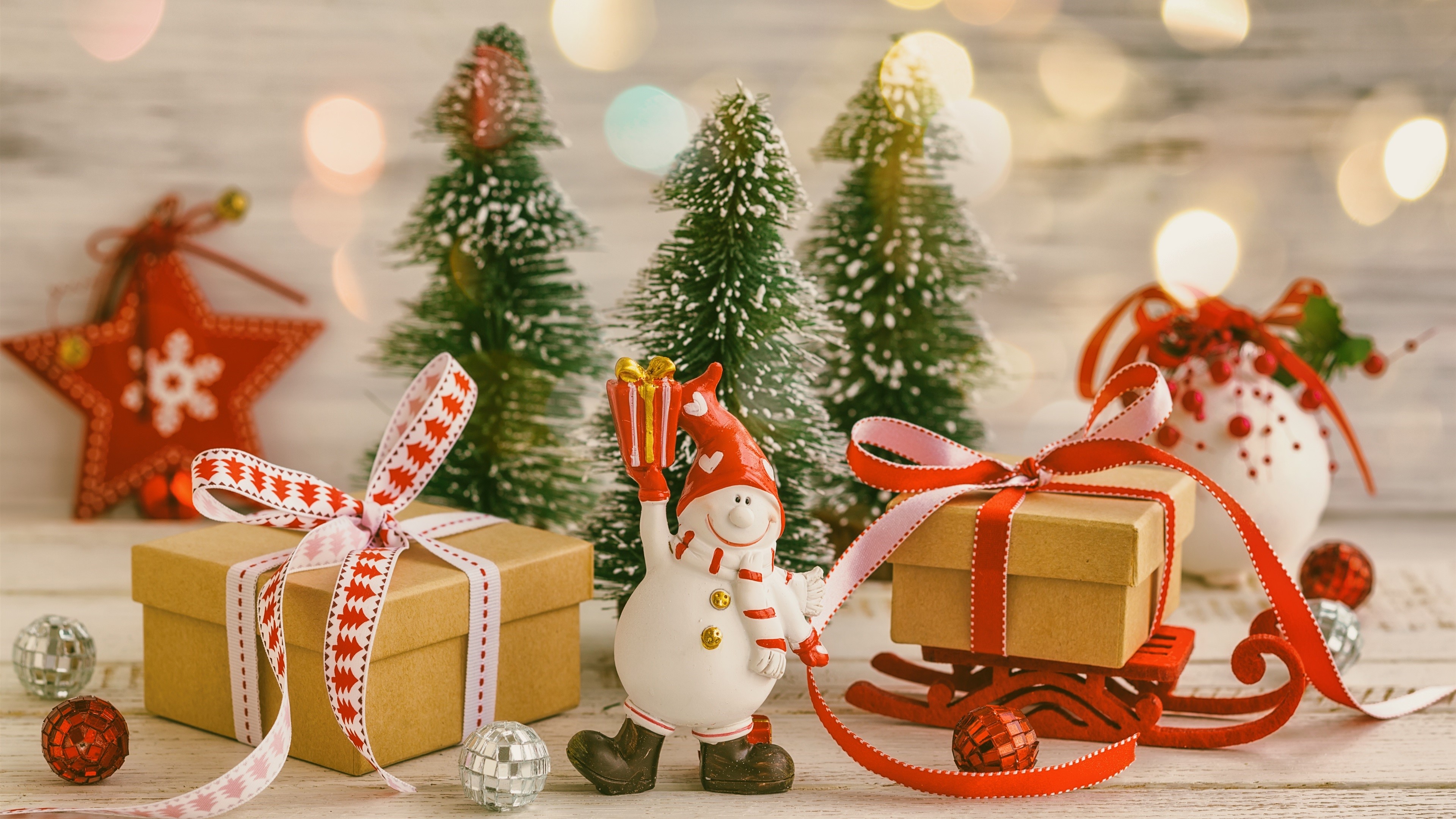 Christmas Gifts with Snowman and Sled HD Wallpaper