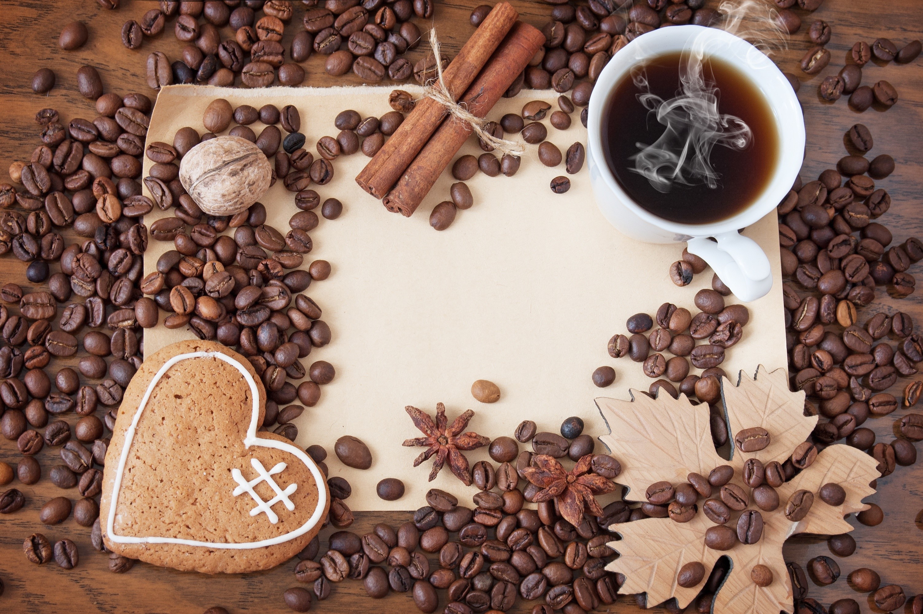 Coffee beans, cinnamon sticks, heart cookie, and coffee cup HD Wallpaper