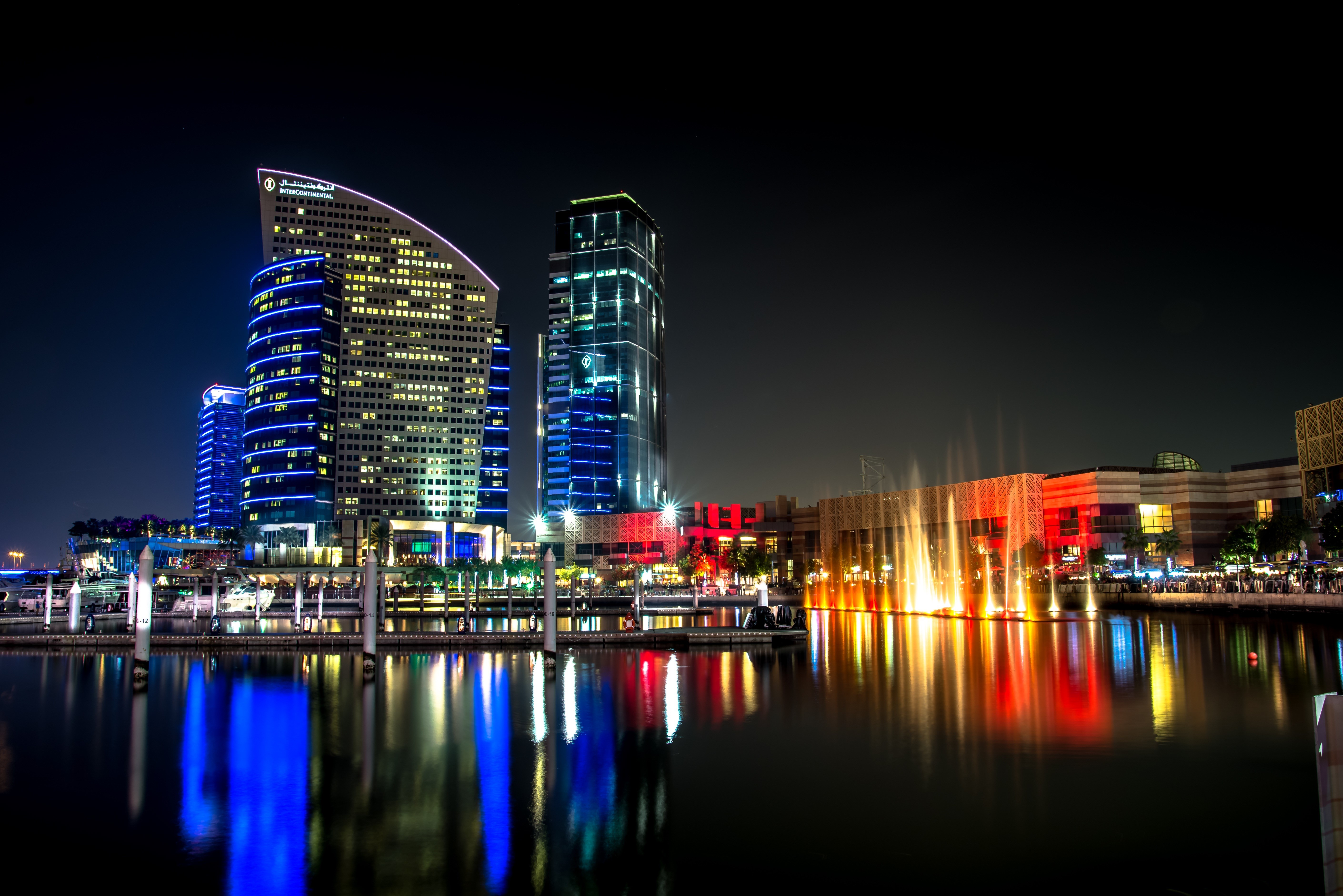Dubai skyscrapers and fountains at night HD Wallpaper