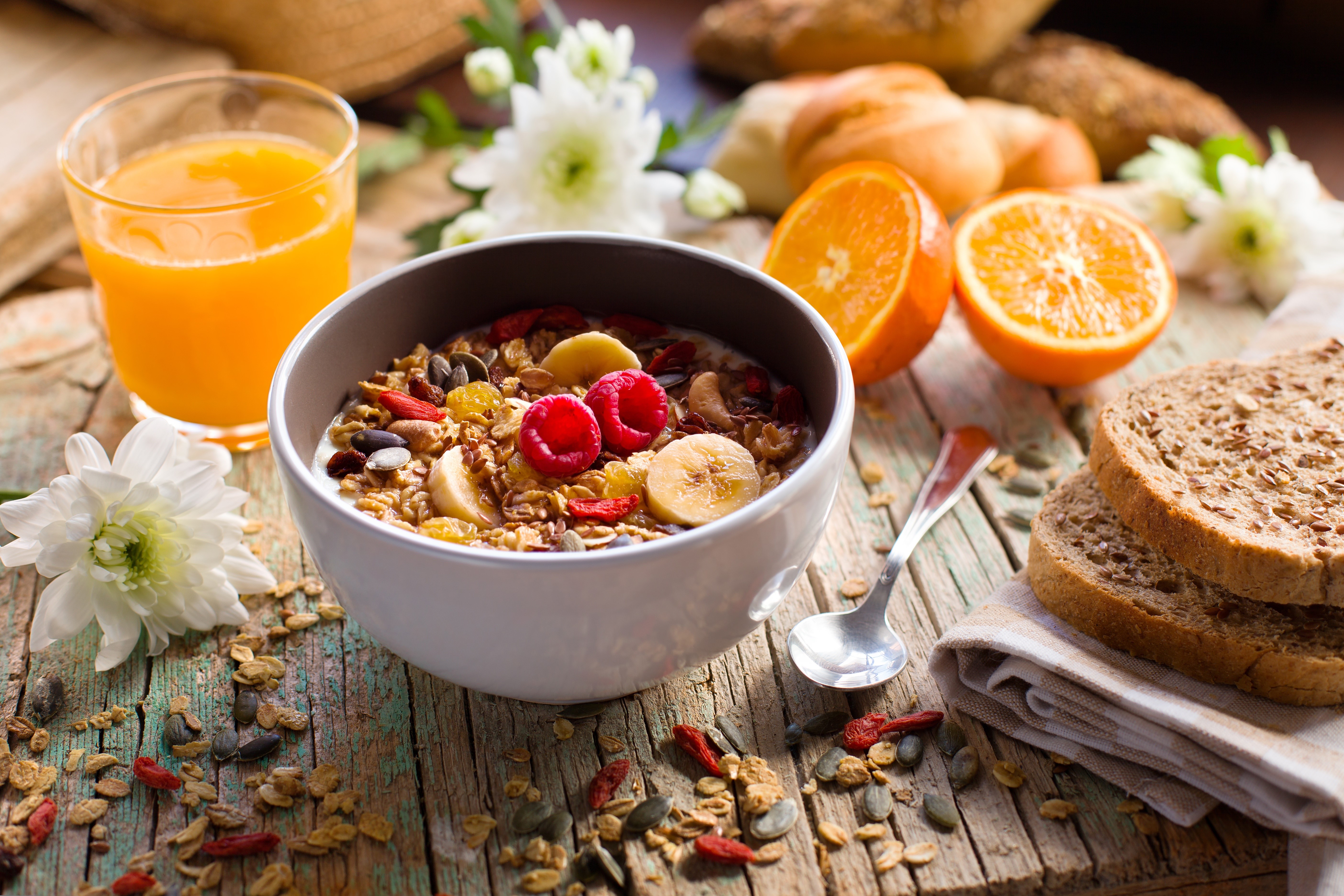 Muesli with fruit and orange juice for breakfast HD Wallpaper