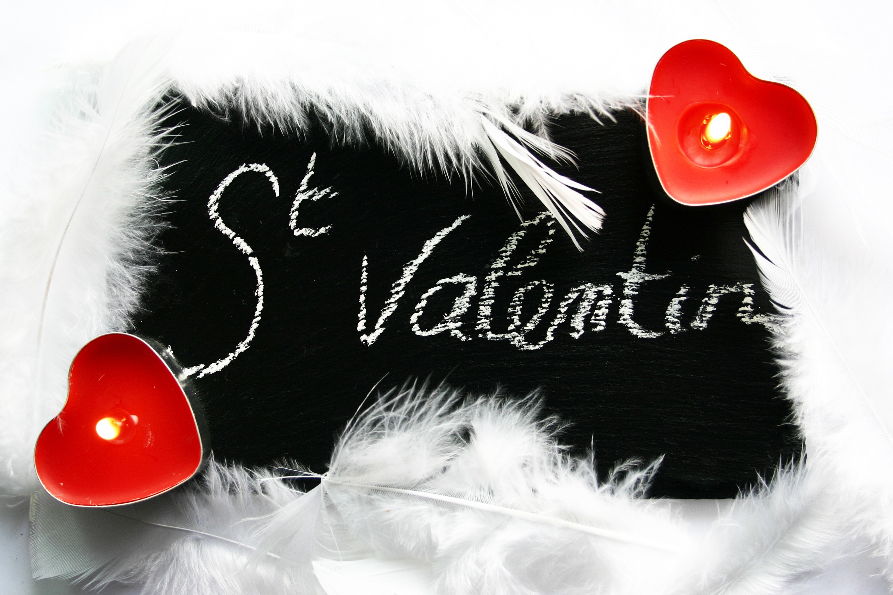 St. Valentine's Day chalkboard with heart candles and feathers HD Wallpaper