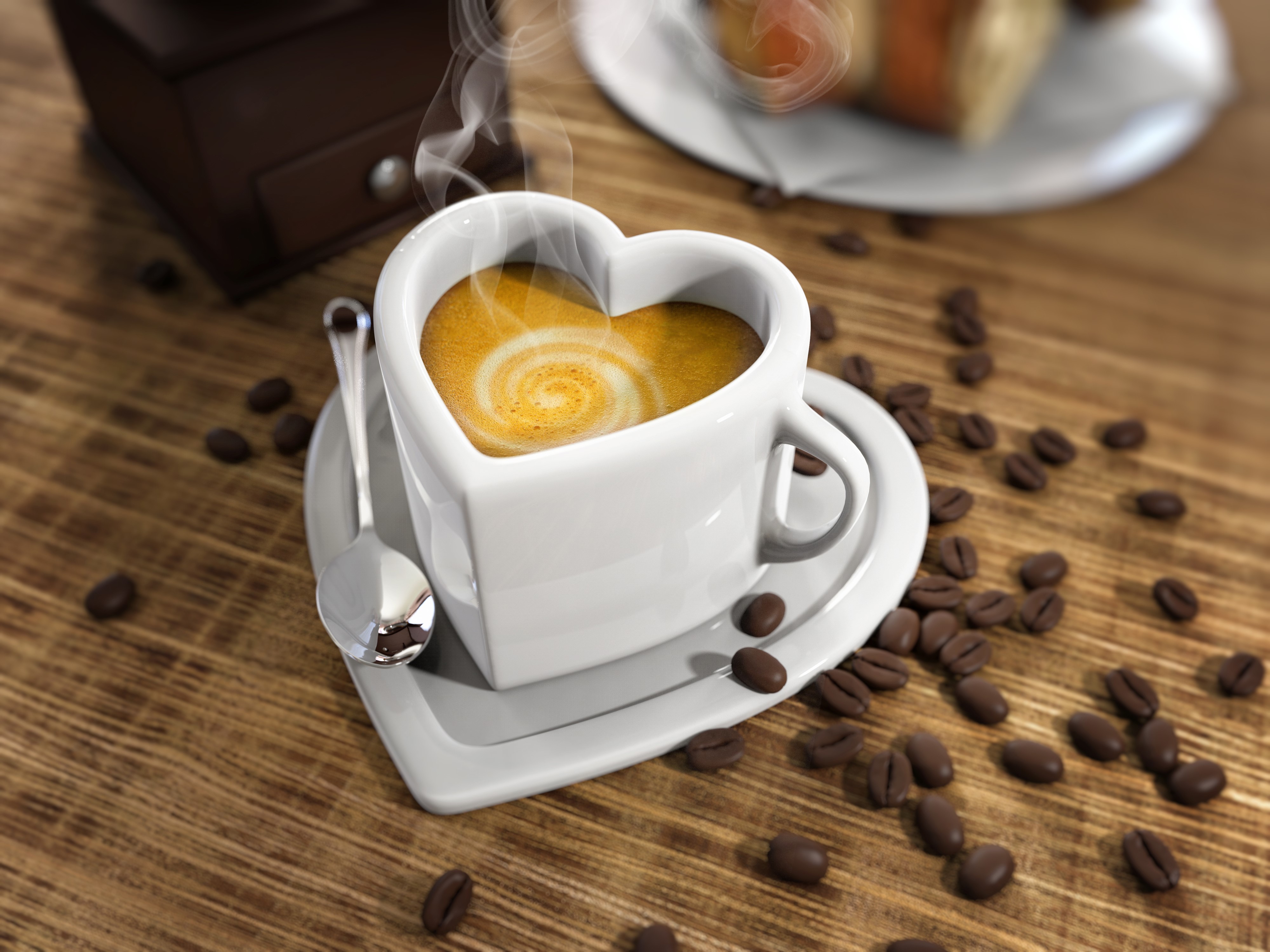 Heart-shaped coffee cup with latte art and coffee beans HD Wallpaper