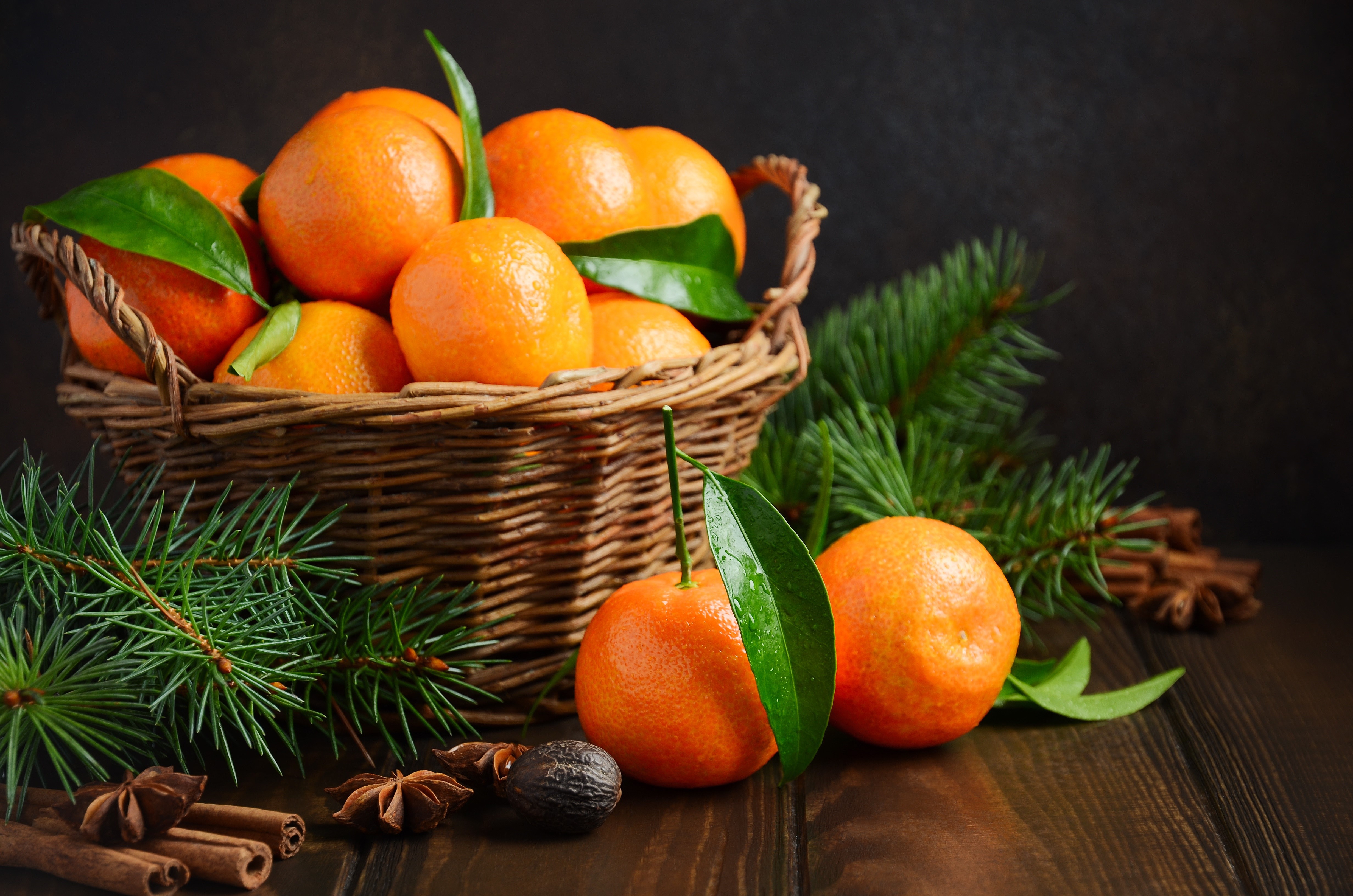 4K Mandarines in a Wicker Basket with Pine Branches HD Wallpaper