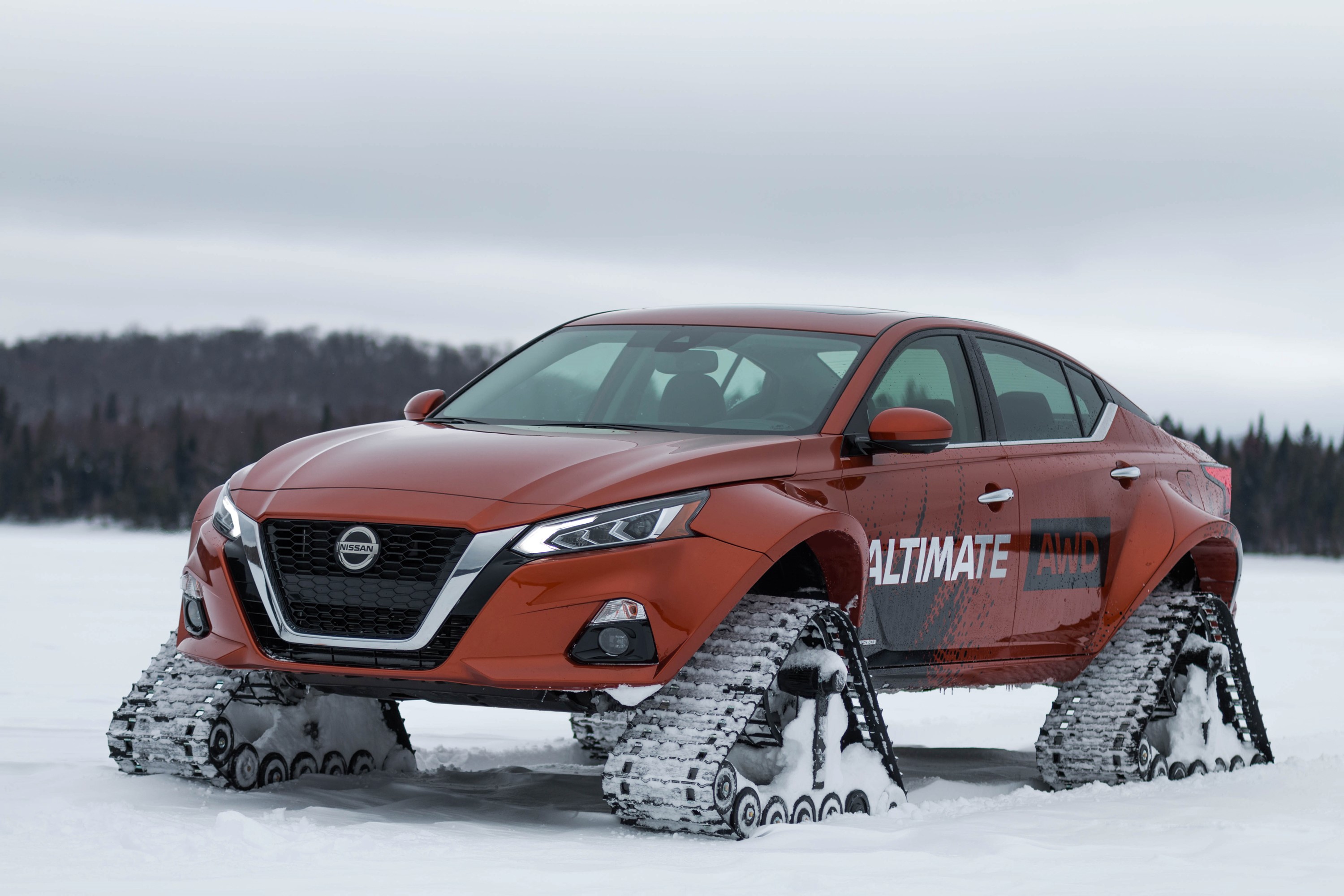 Nissan Altima-te AWD Concept with tracks in snow HD Wallpaper