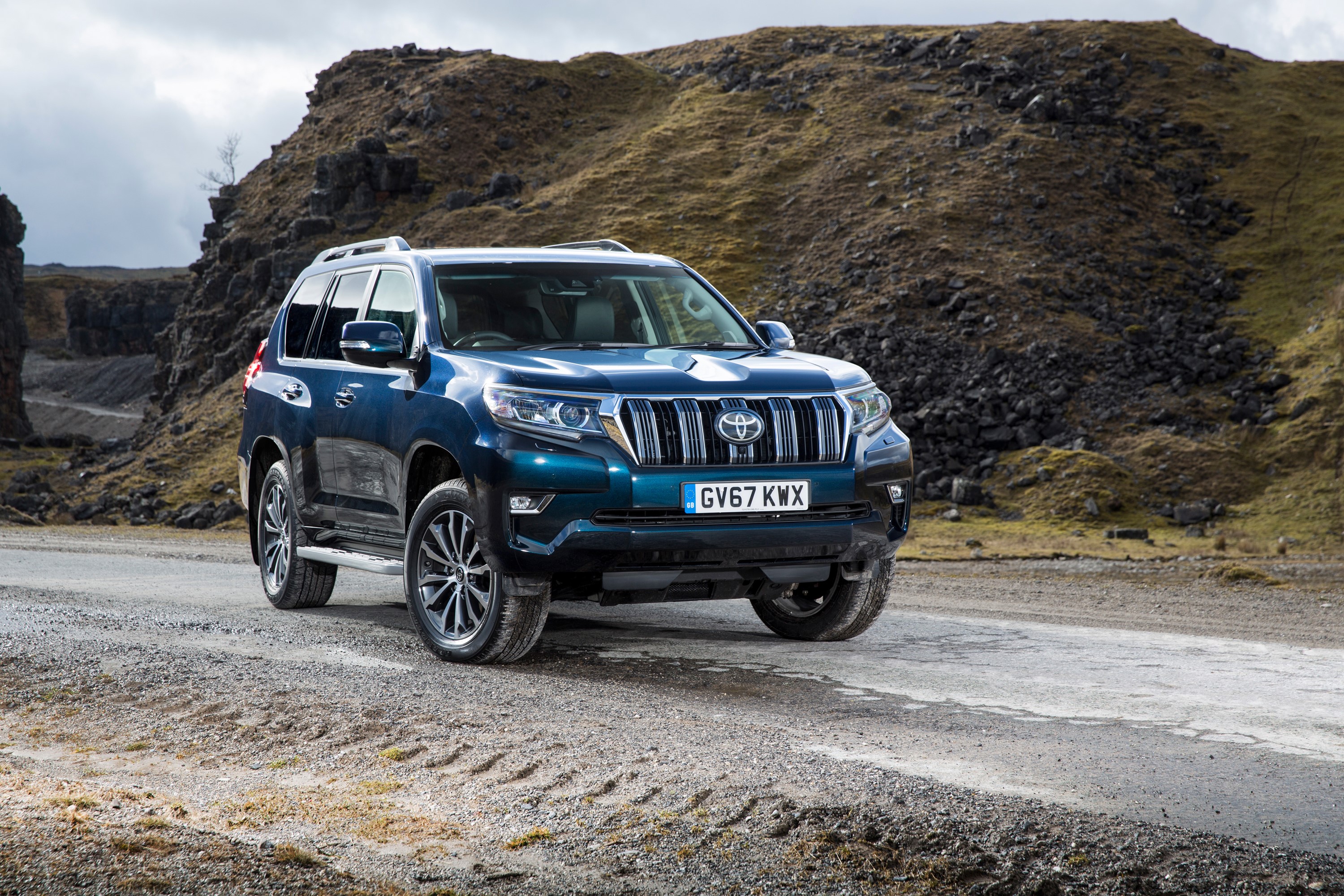 Blue 2018 Toyota Land Cruiser SUV on a dirt road HD Wallpaper