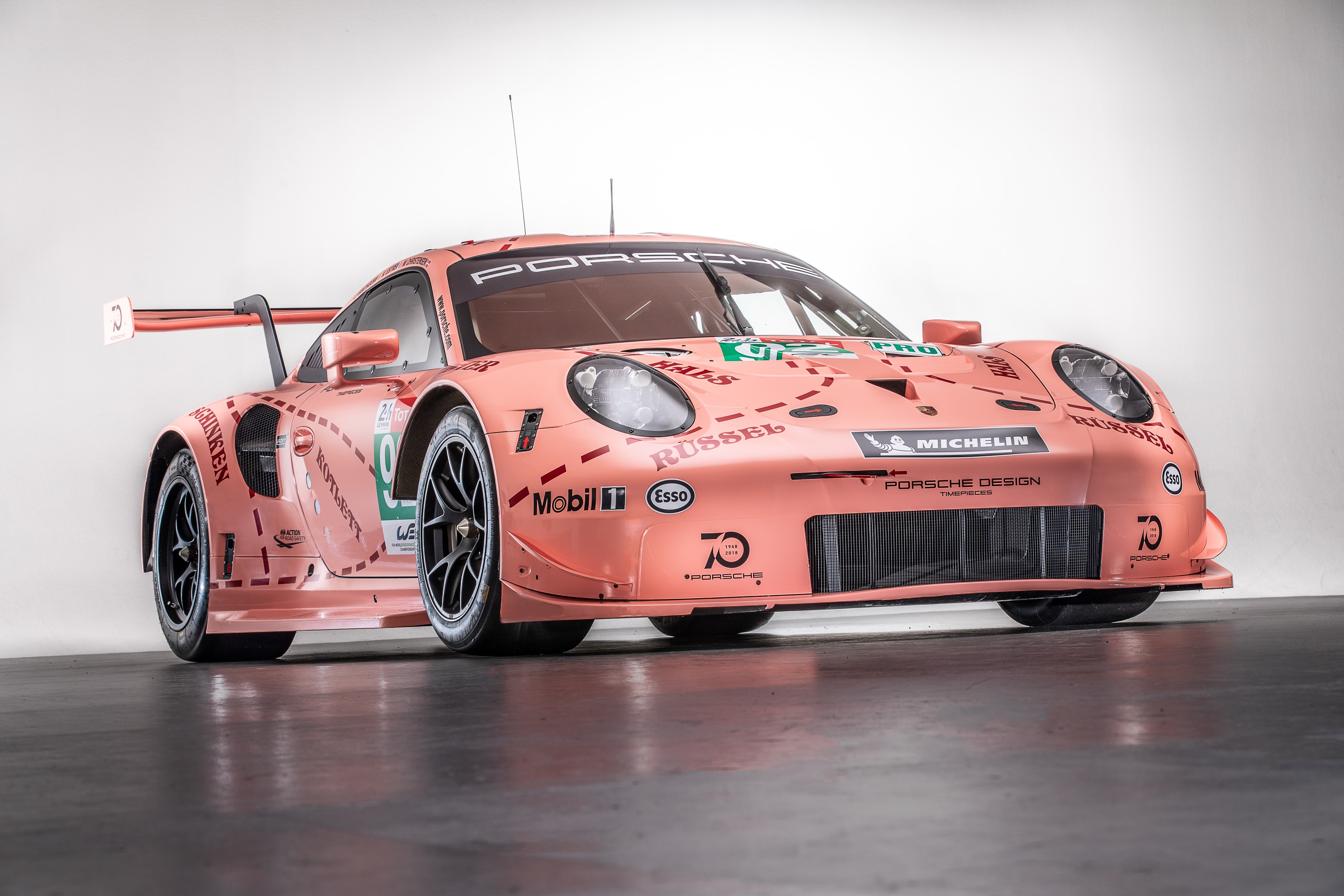 Porsche 911 RSR race car in pink livery HD Wallpaper