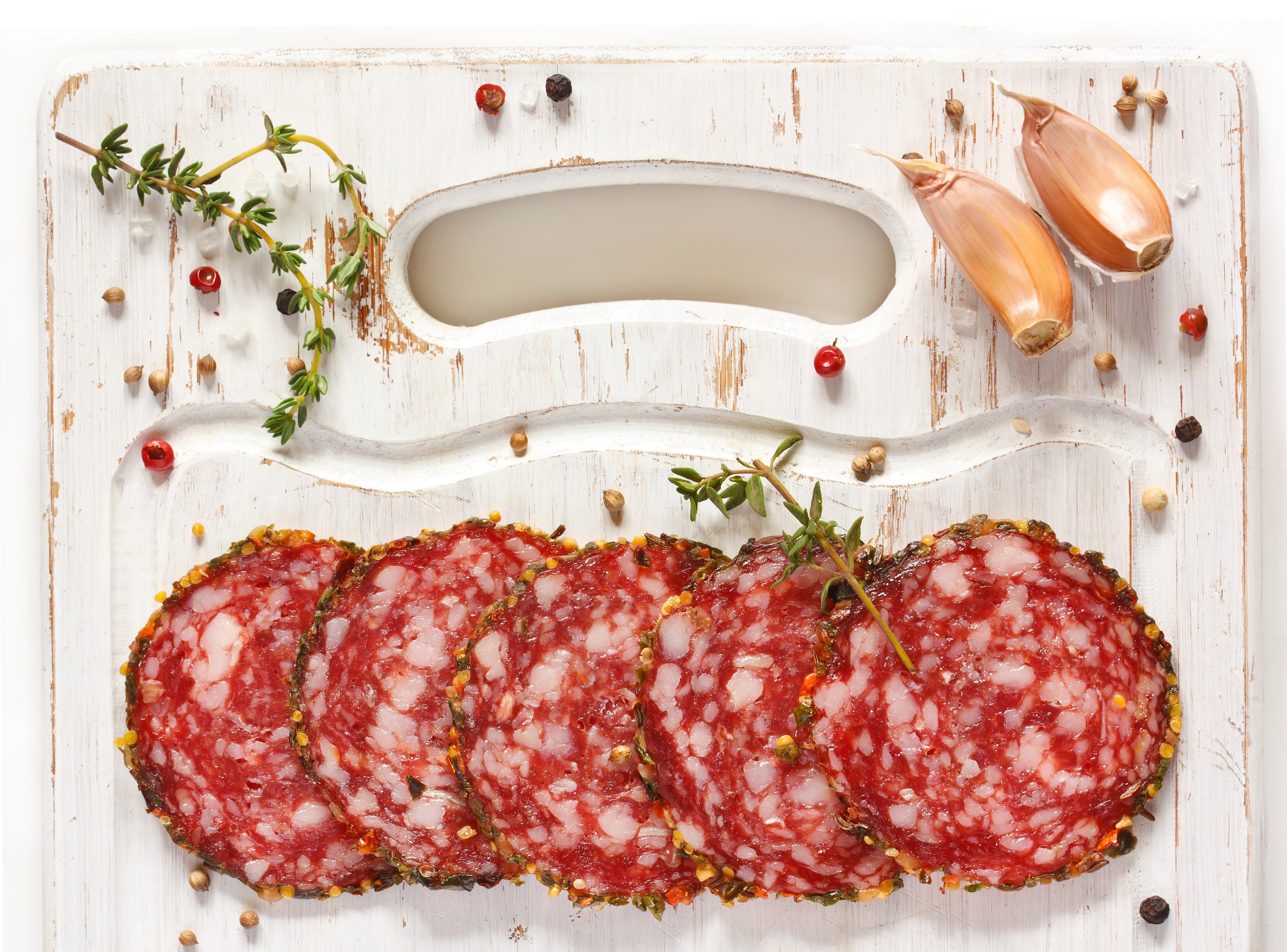 Sliced Sausage with Garlic and Herbs on Cutting Board HD Wallpaper
