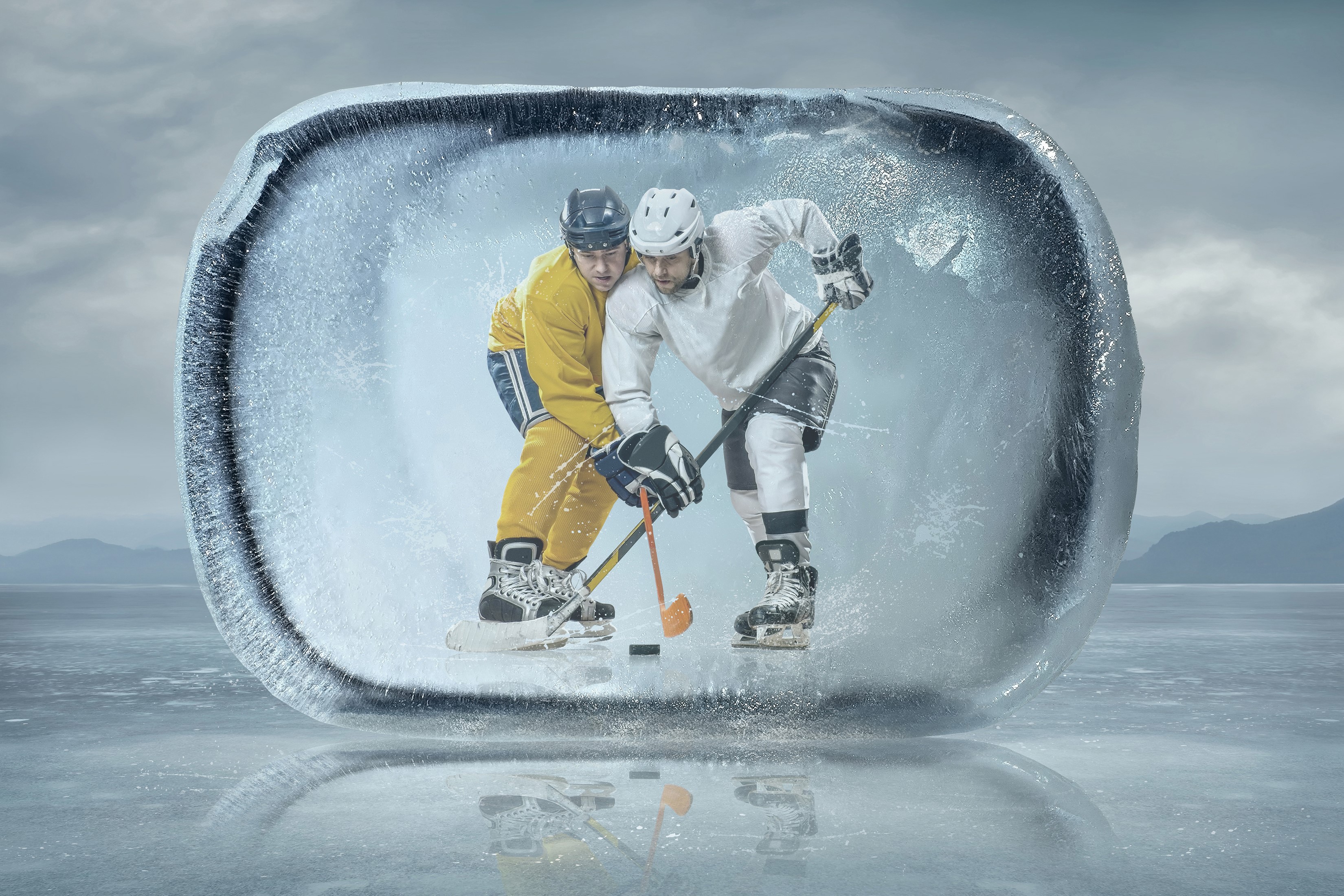 Two hockey players in an ice block HD Wallpaper