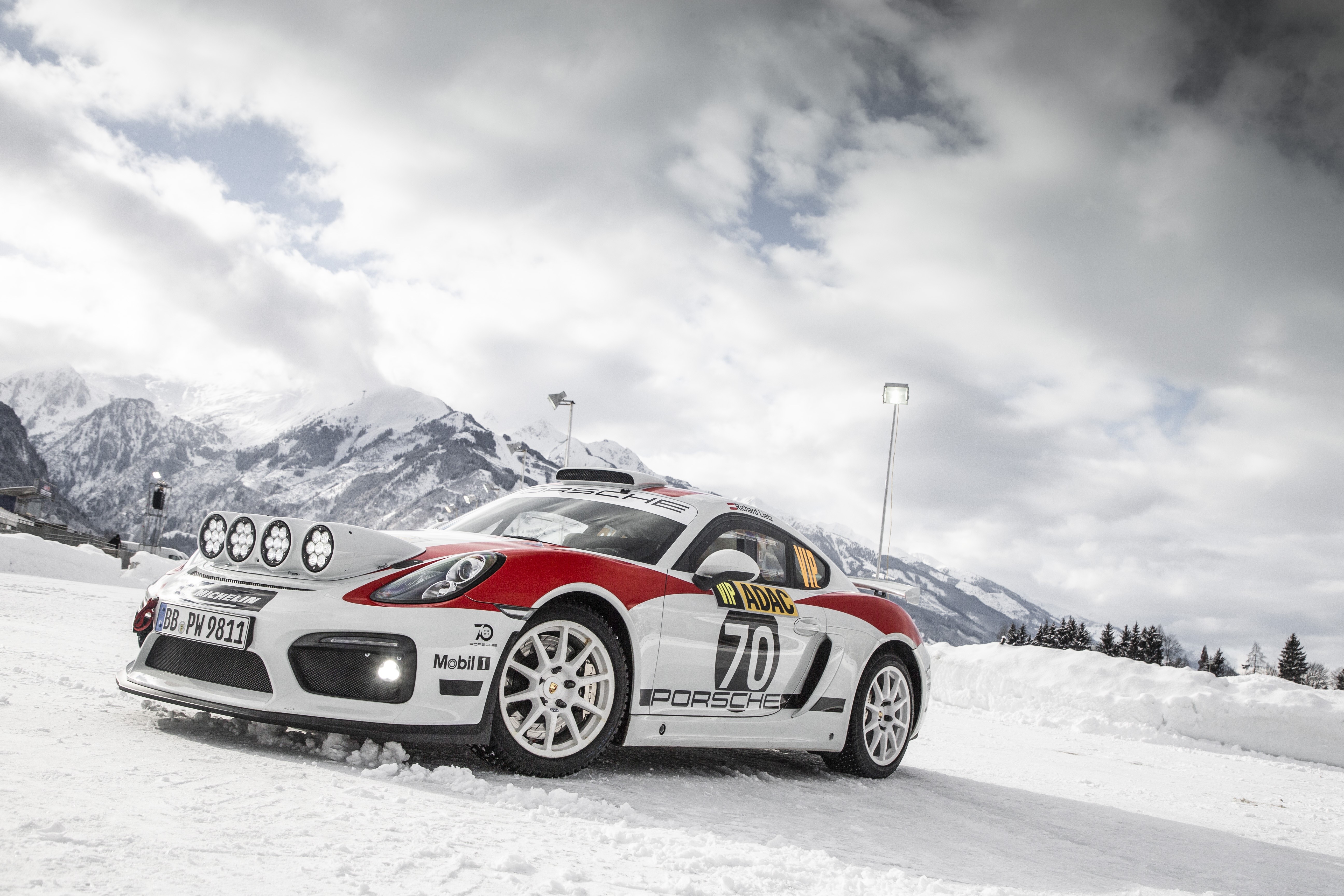 Porsche Cayman GT4 Rally car in snow HD Wallpaper