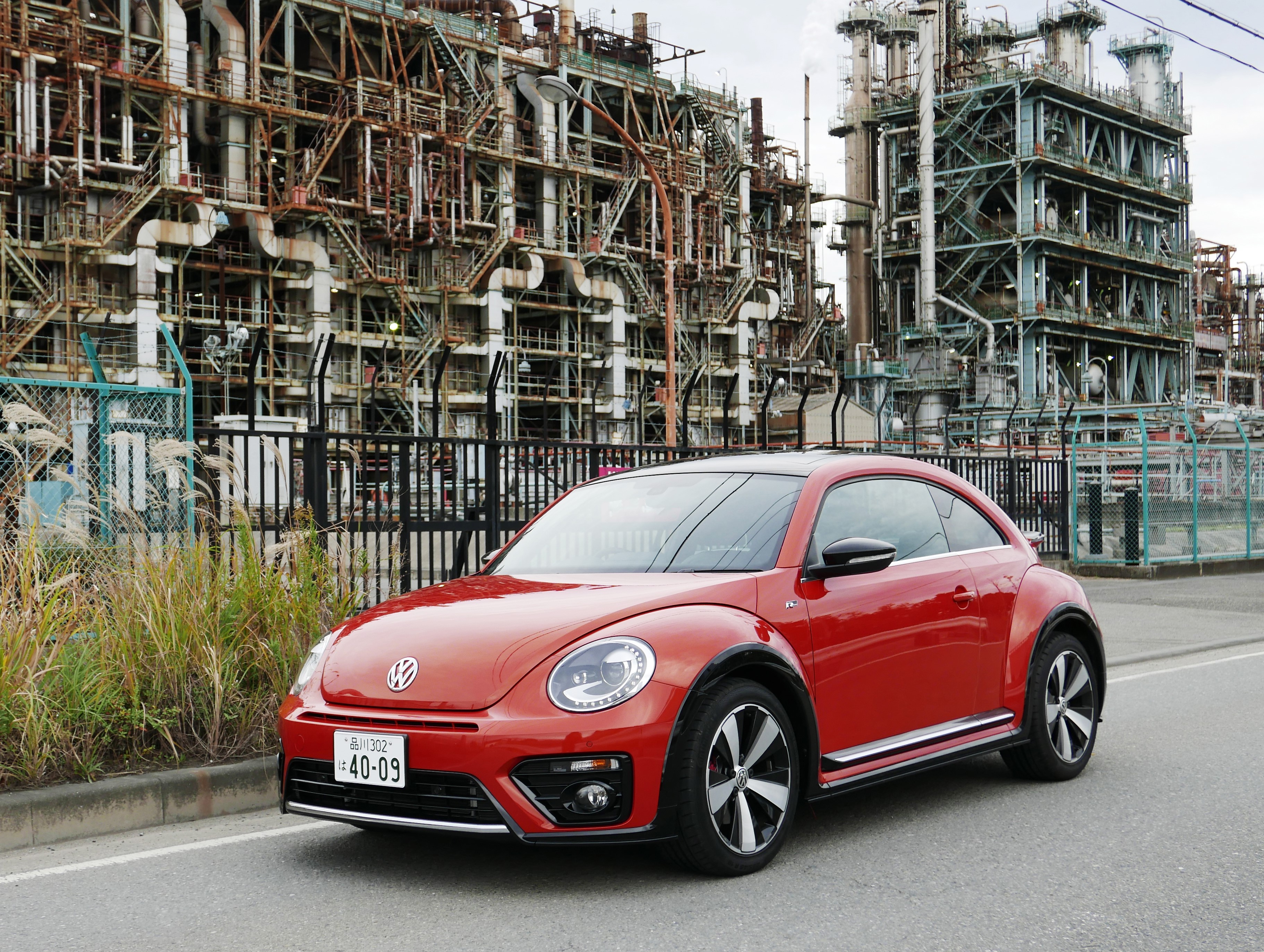 Red Volkswagen Beetle R-Line at Industrial Plant HD Wallpaper