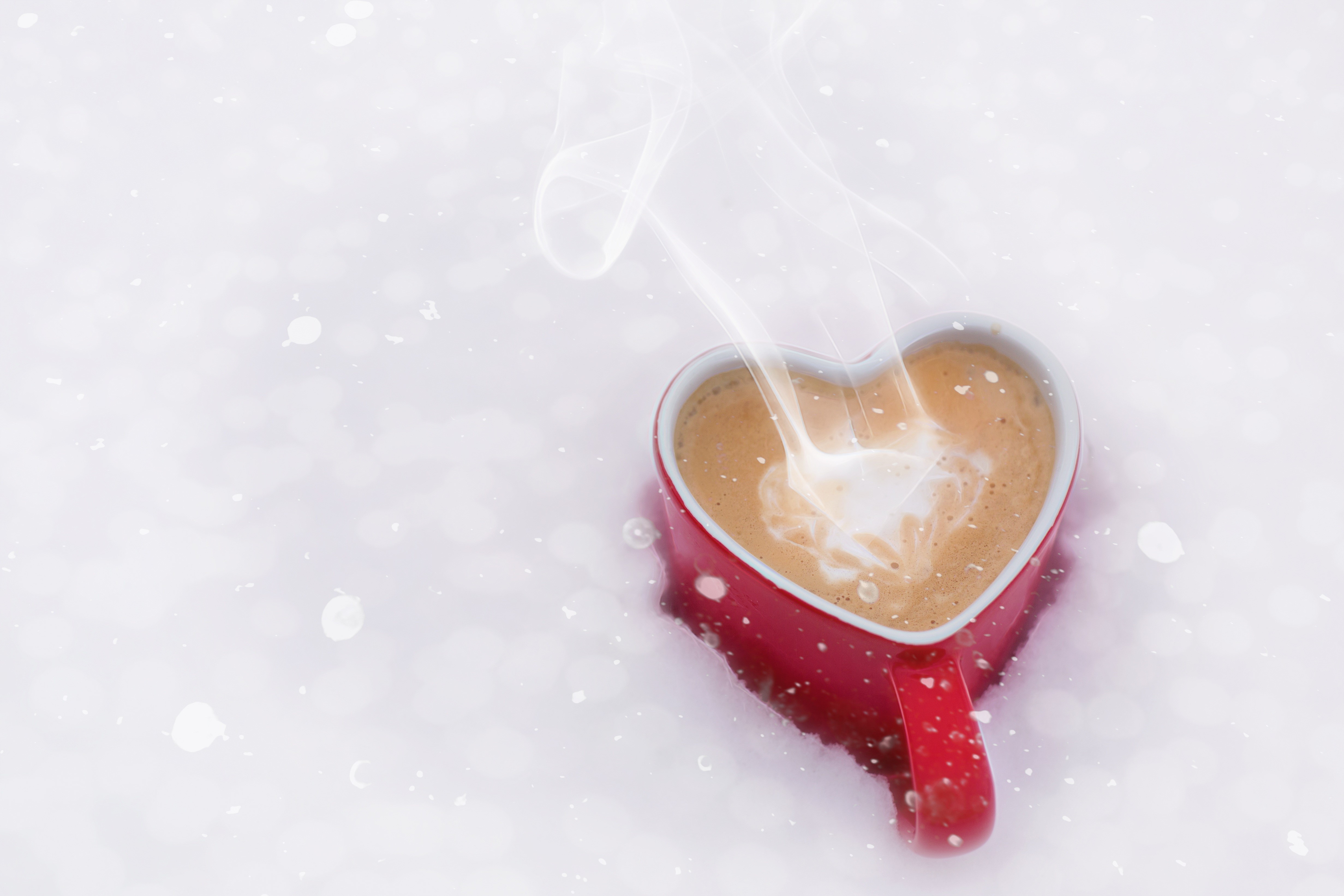 Heart-shaped mug of coffee with steam HD Wallpaper