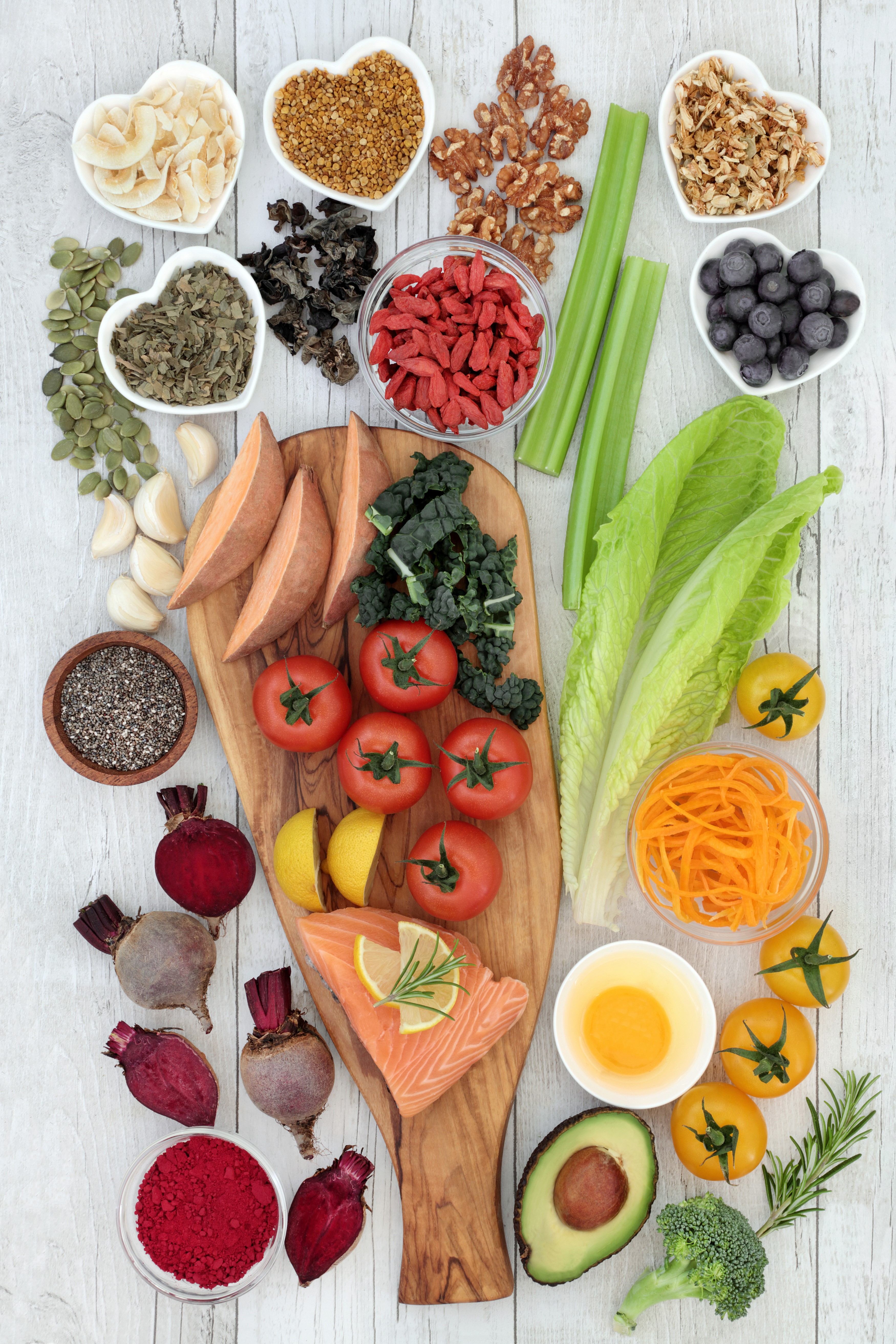 Healthy food assortment on a wooden board HD Phone Wallpaper