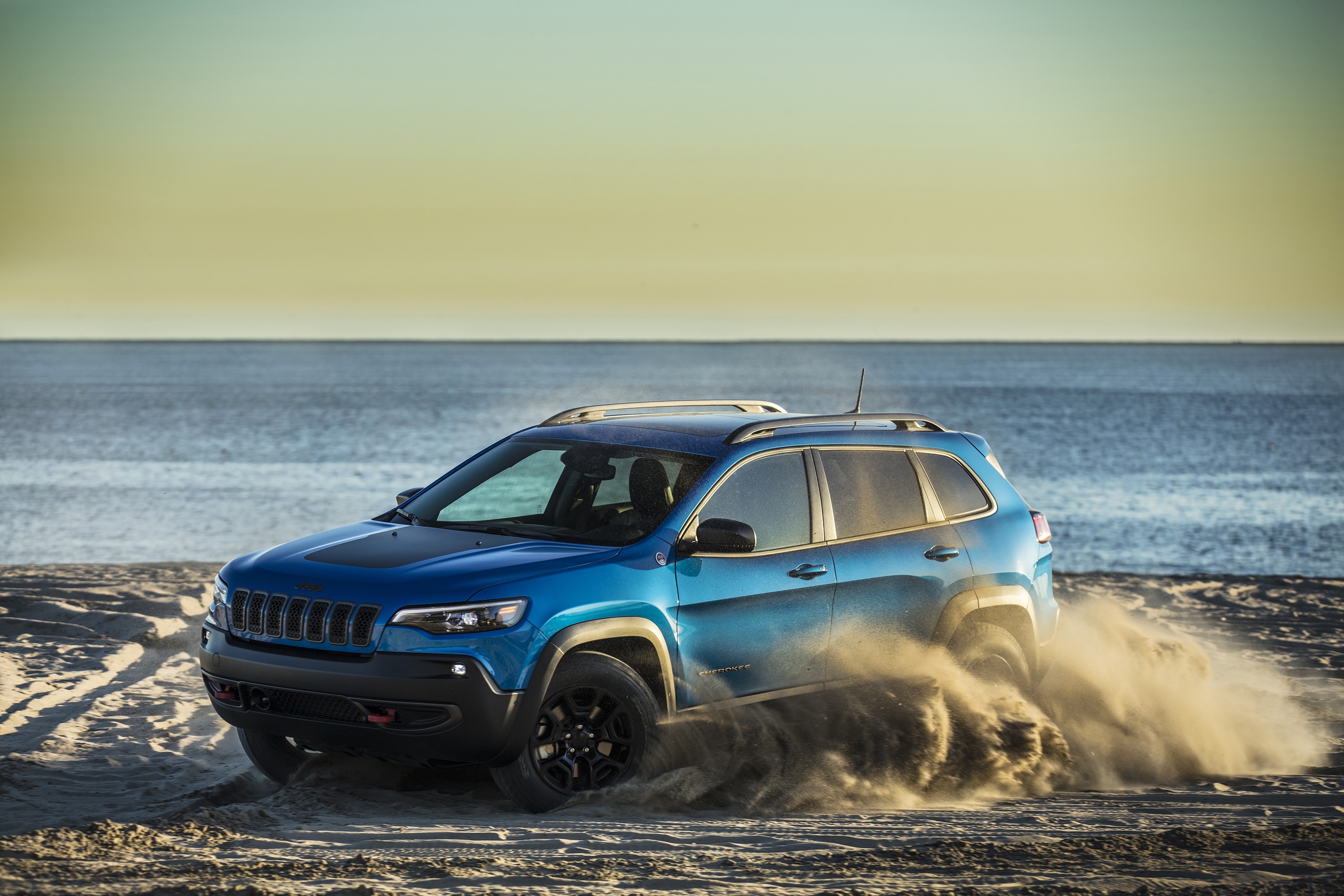 Blue 2019 Jeep Cherokee Trailhawk on a Beach HD Wallpaper