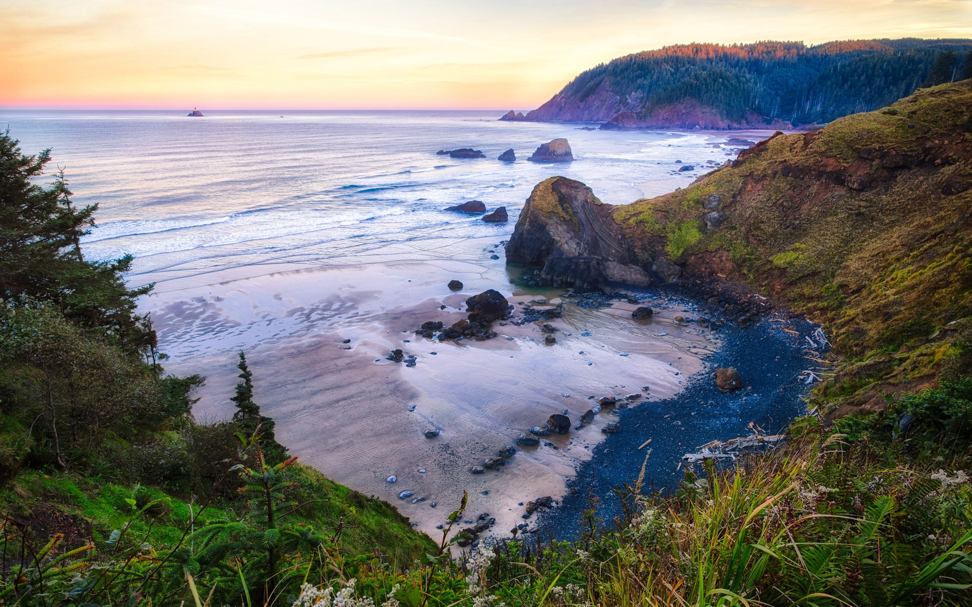 Coastal cliffs overlooking a beach at sunset HD Wallpaper