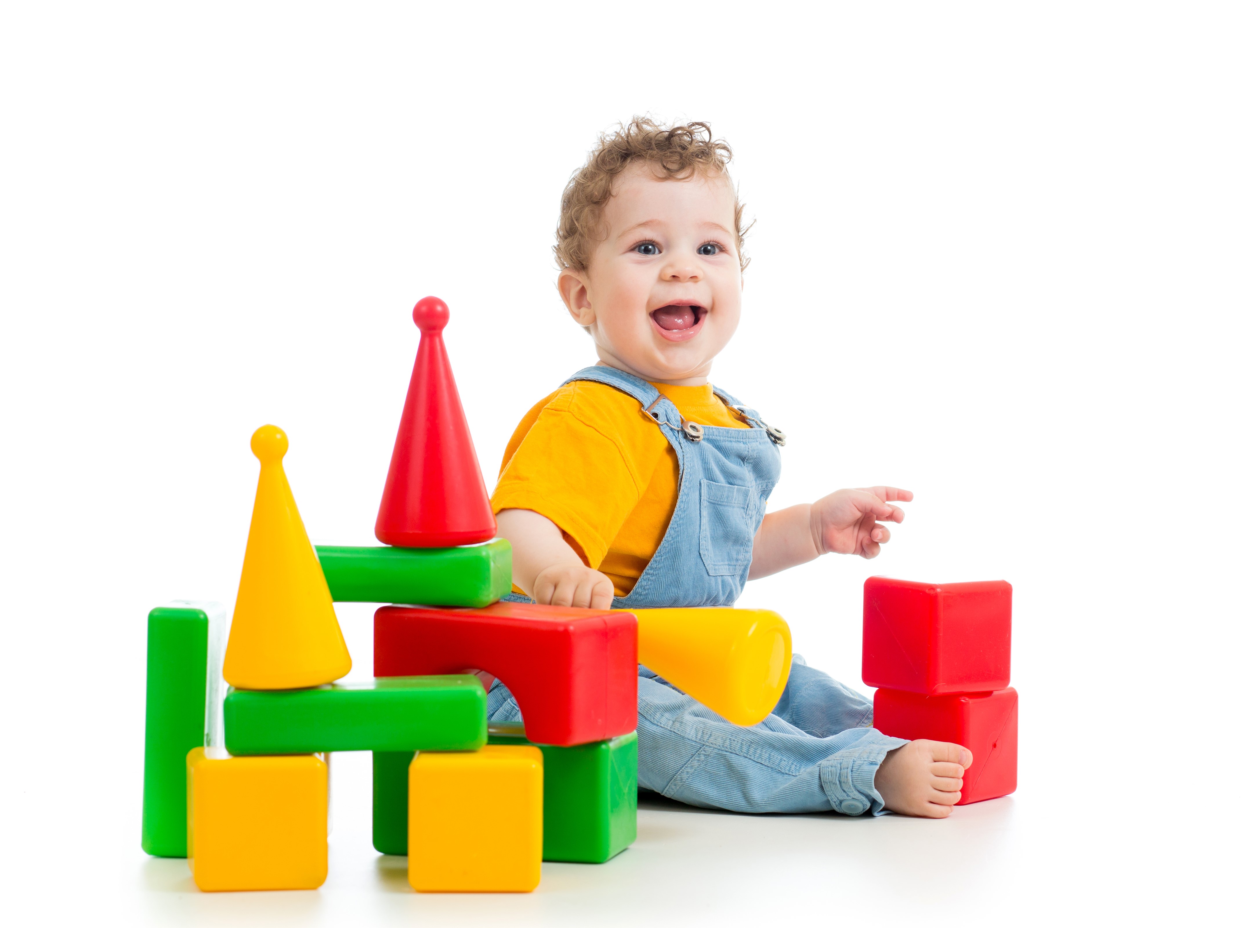 Baby playing with colorful blocks on white background HD Wallpaper