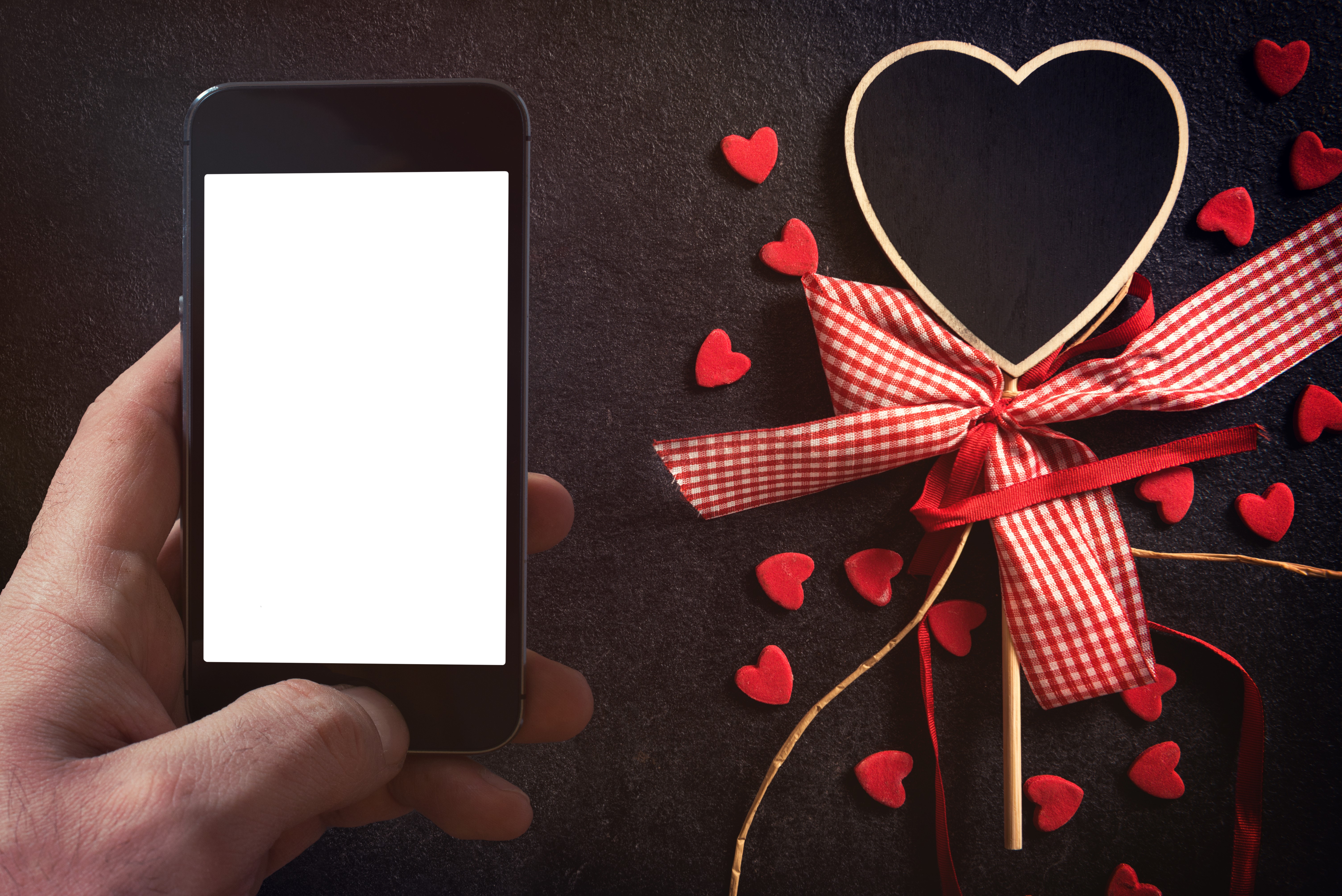 Smartphone with Valentine's Day heart decoration HD Wallpaper