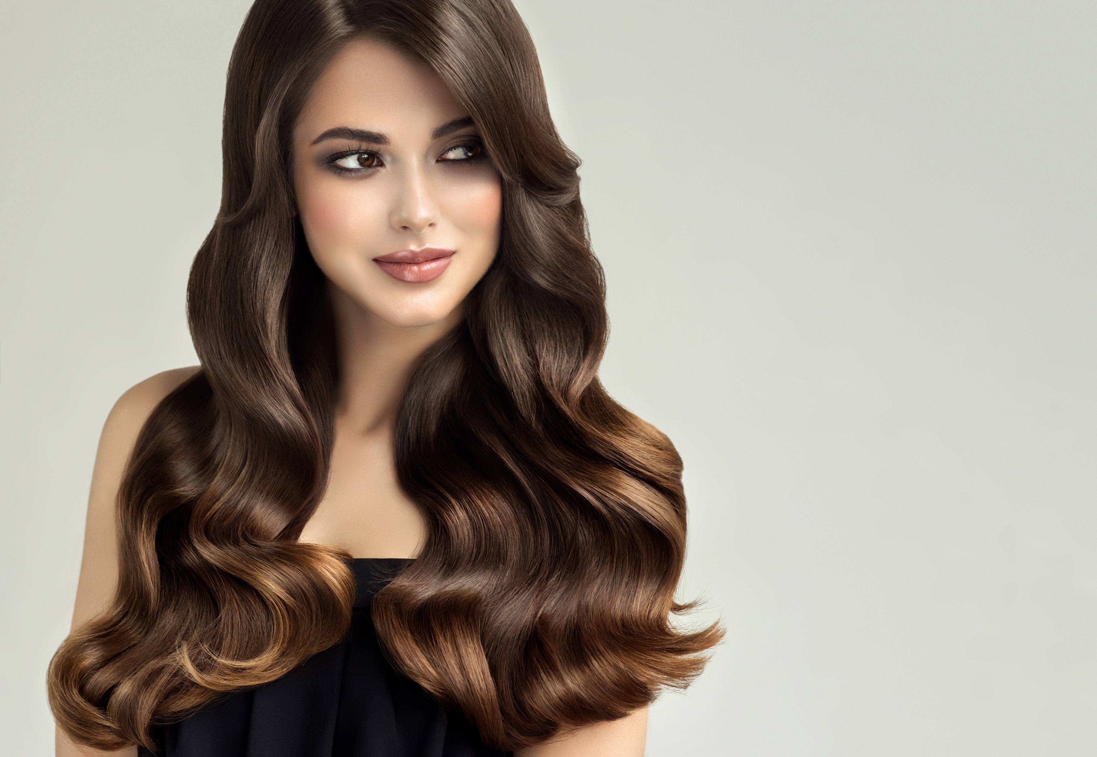 Woman with long wavy brown hair HD Wallpaper