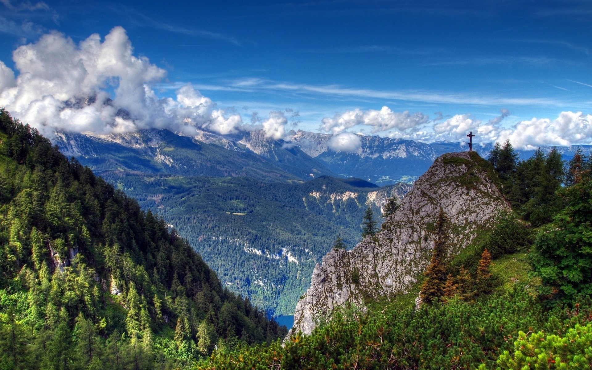 Mountain landscape with a cross on a peak HD Wallpaper