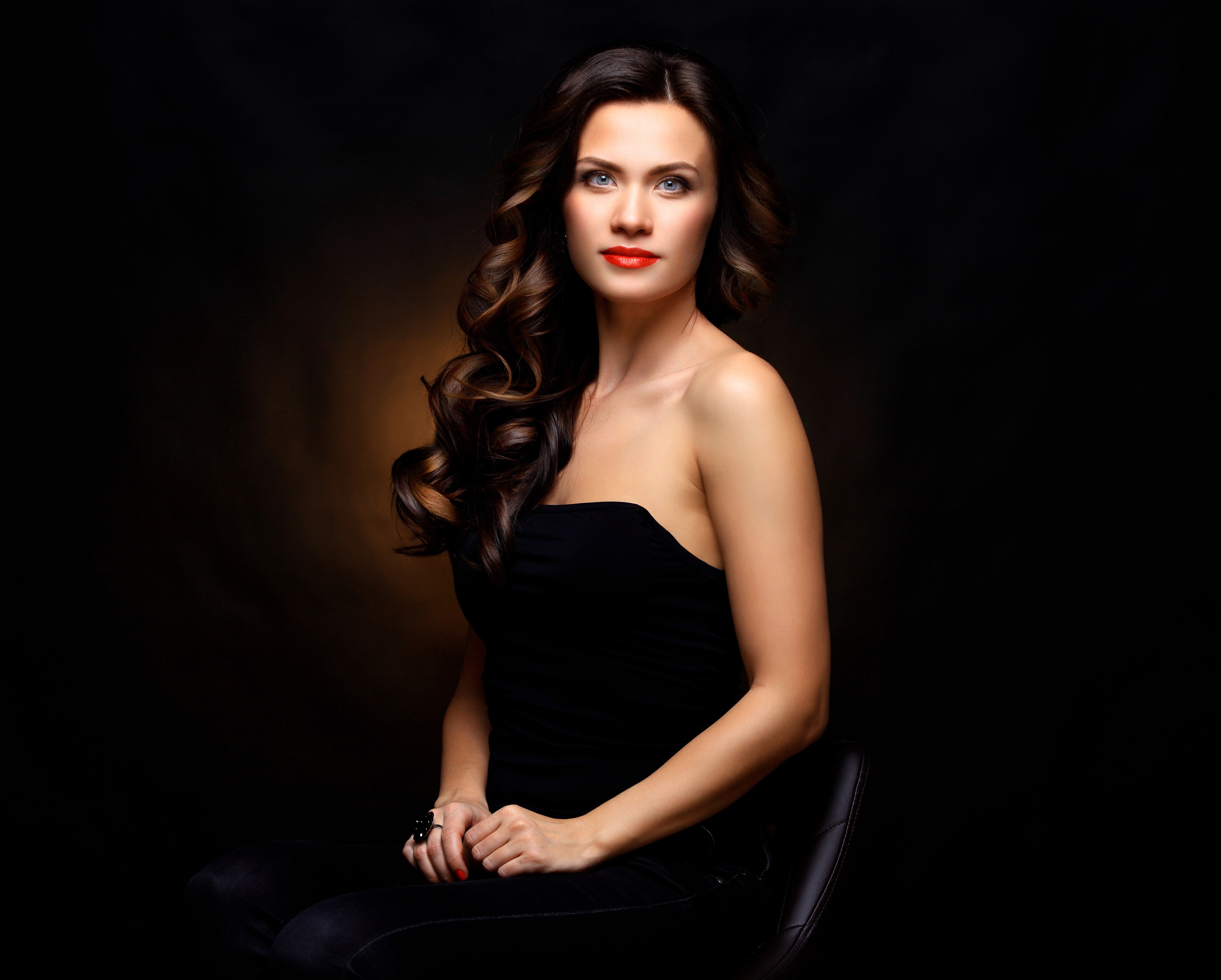 Woman with brown hair sitting HD Wallpaper