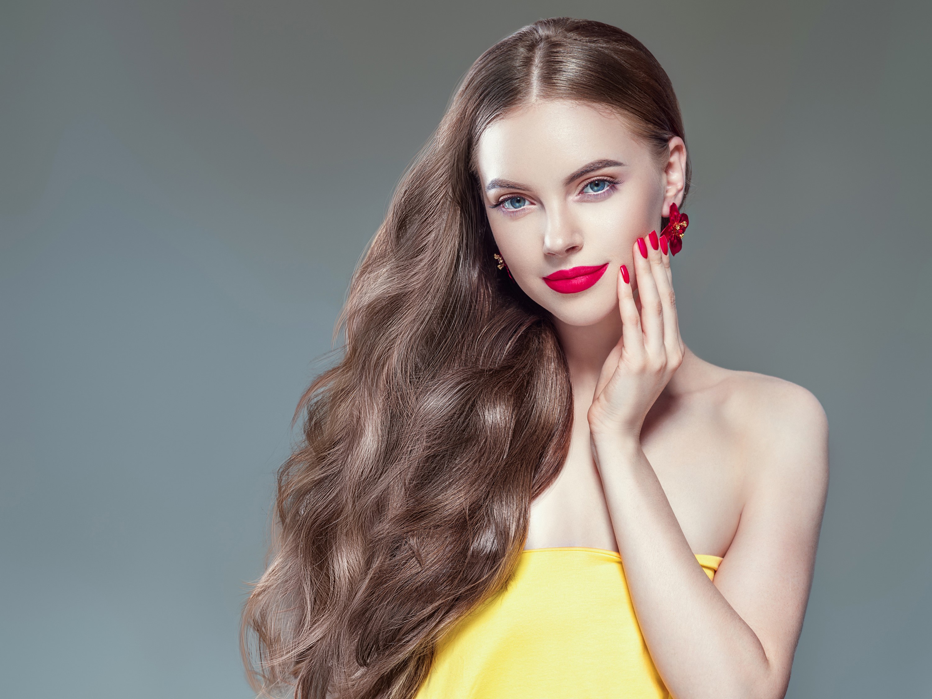 Woman with long brown hair and red lips HD Wallpaper