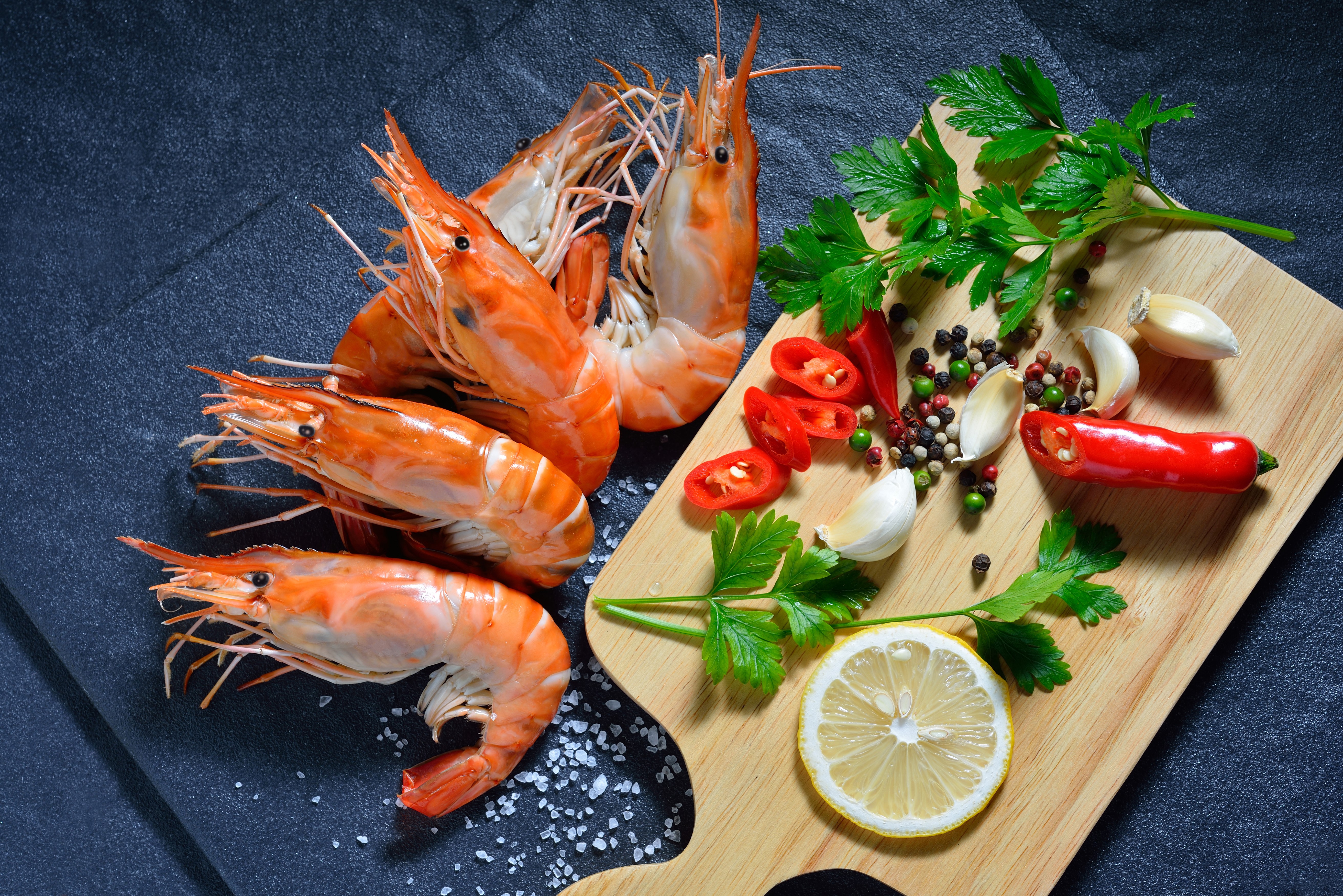 Shrimp with Spices, Lemon, and Garlic on Cutting Board HD Wallpaper
