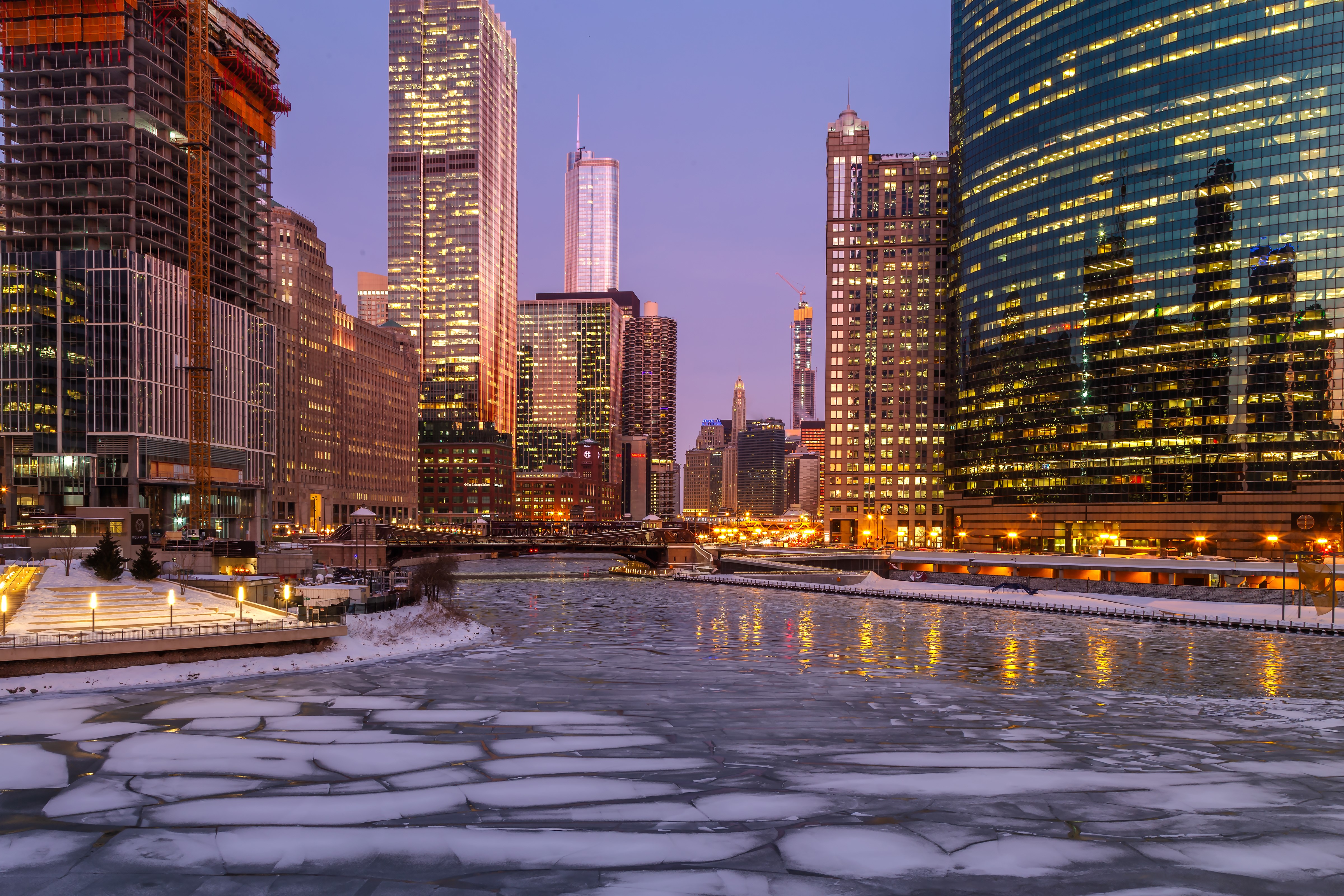Chicago city skyline over frozen river at dusk HD Wallpaper